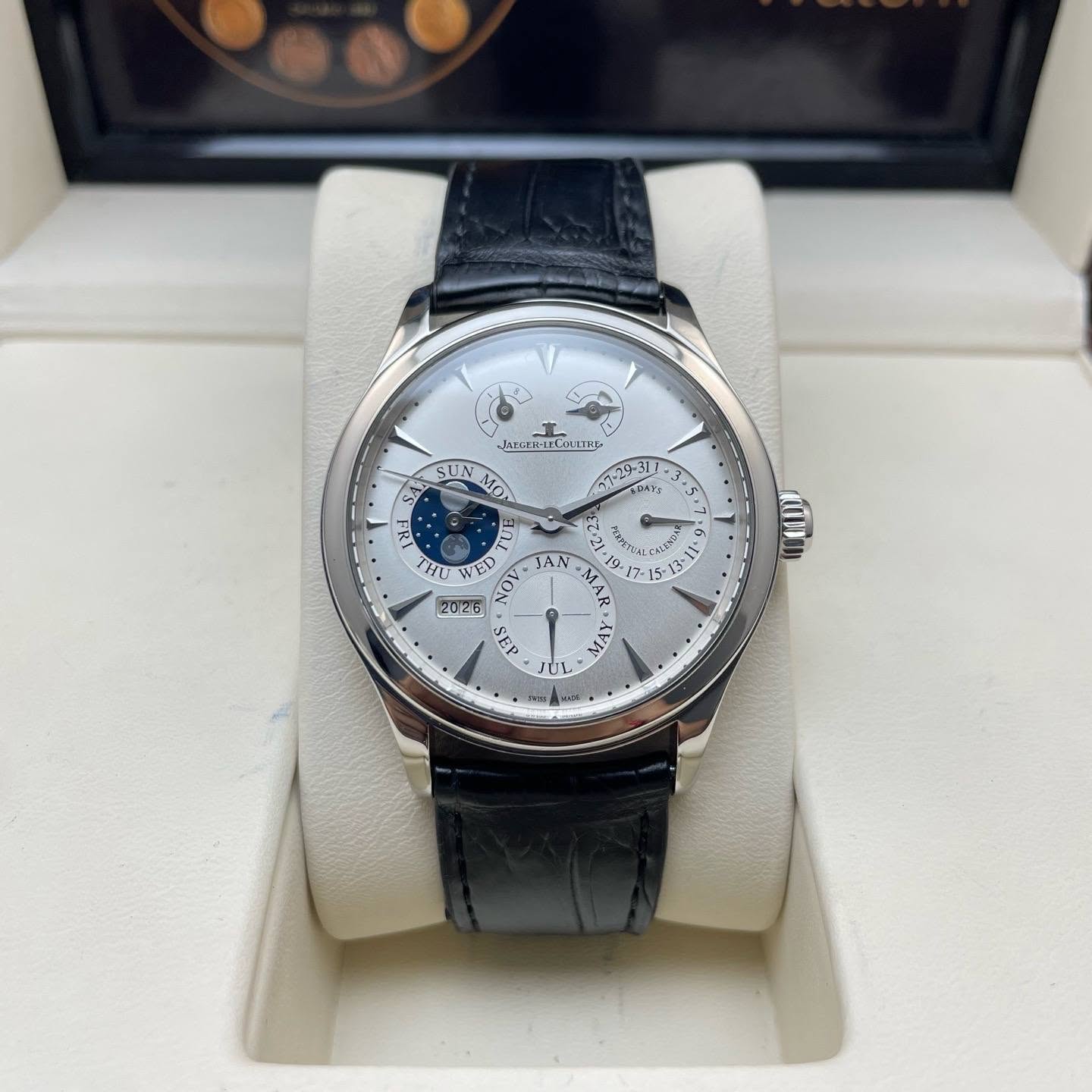 May be an image of wrist watch and text
