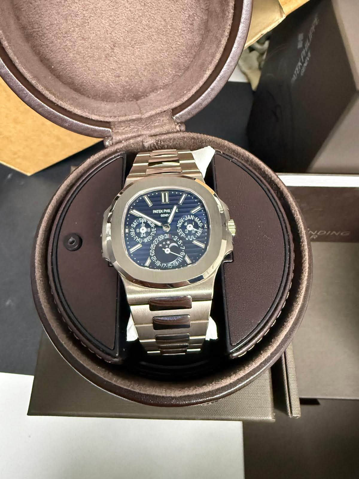 May be an image of wrist watch and text that says 'ن PATE ATEX.PMIL A SHA ر 3 8 O F4 HU ب * JA MAA MAD MA 23 EP. ng -13 福'