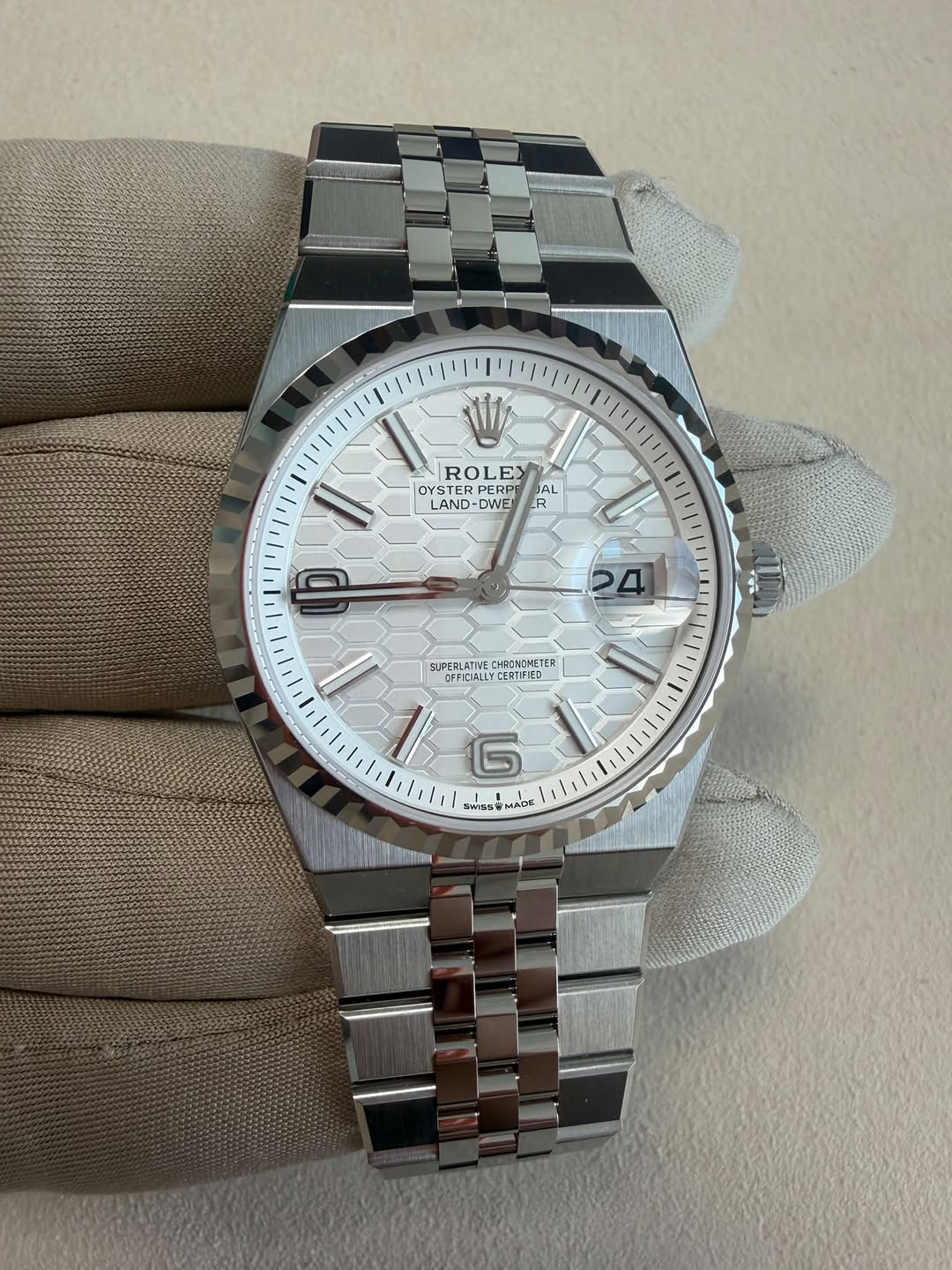 May be an image of wrist watch and text