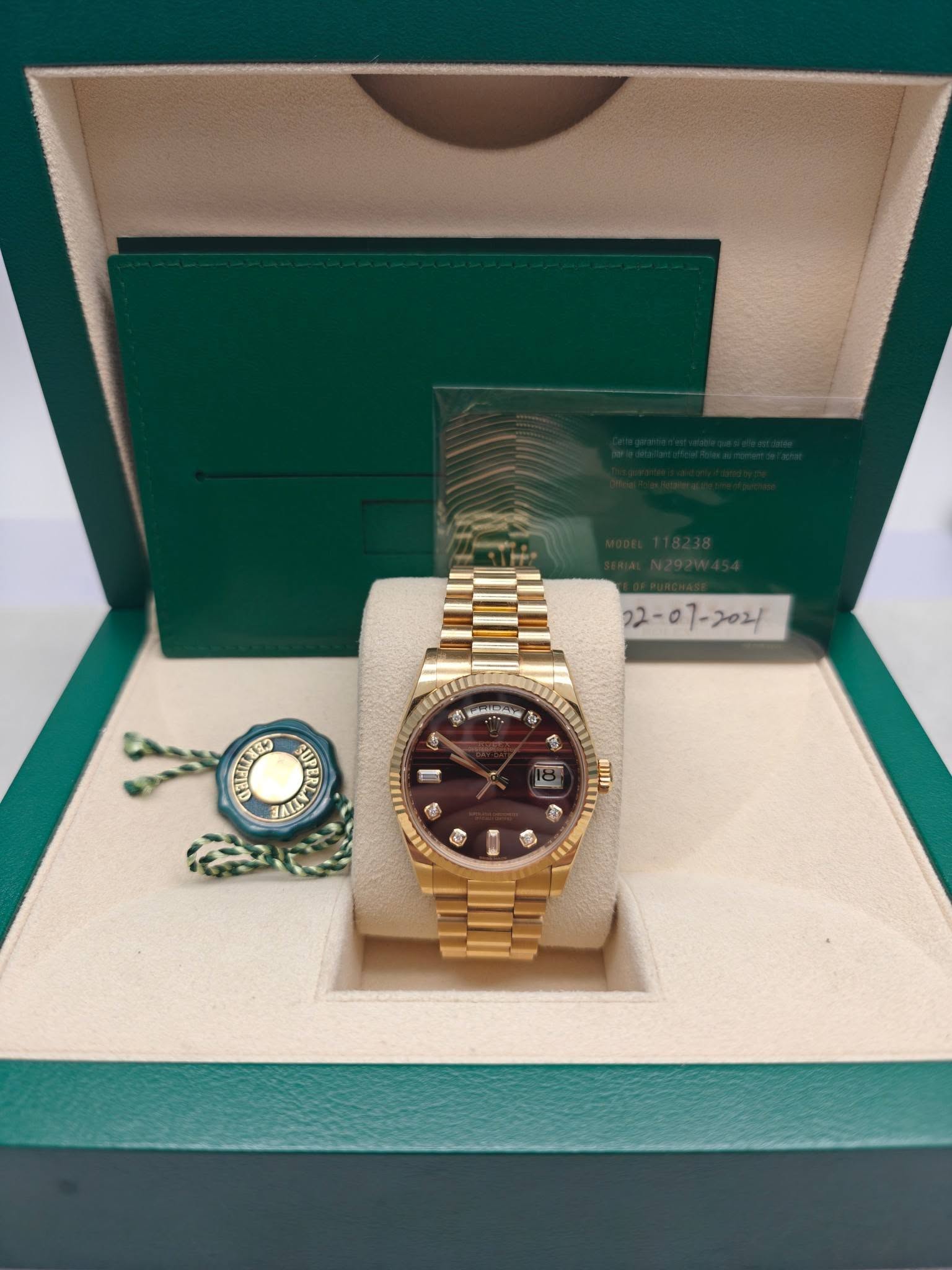 May be an image of wrist watch and text