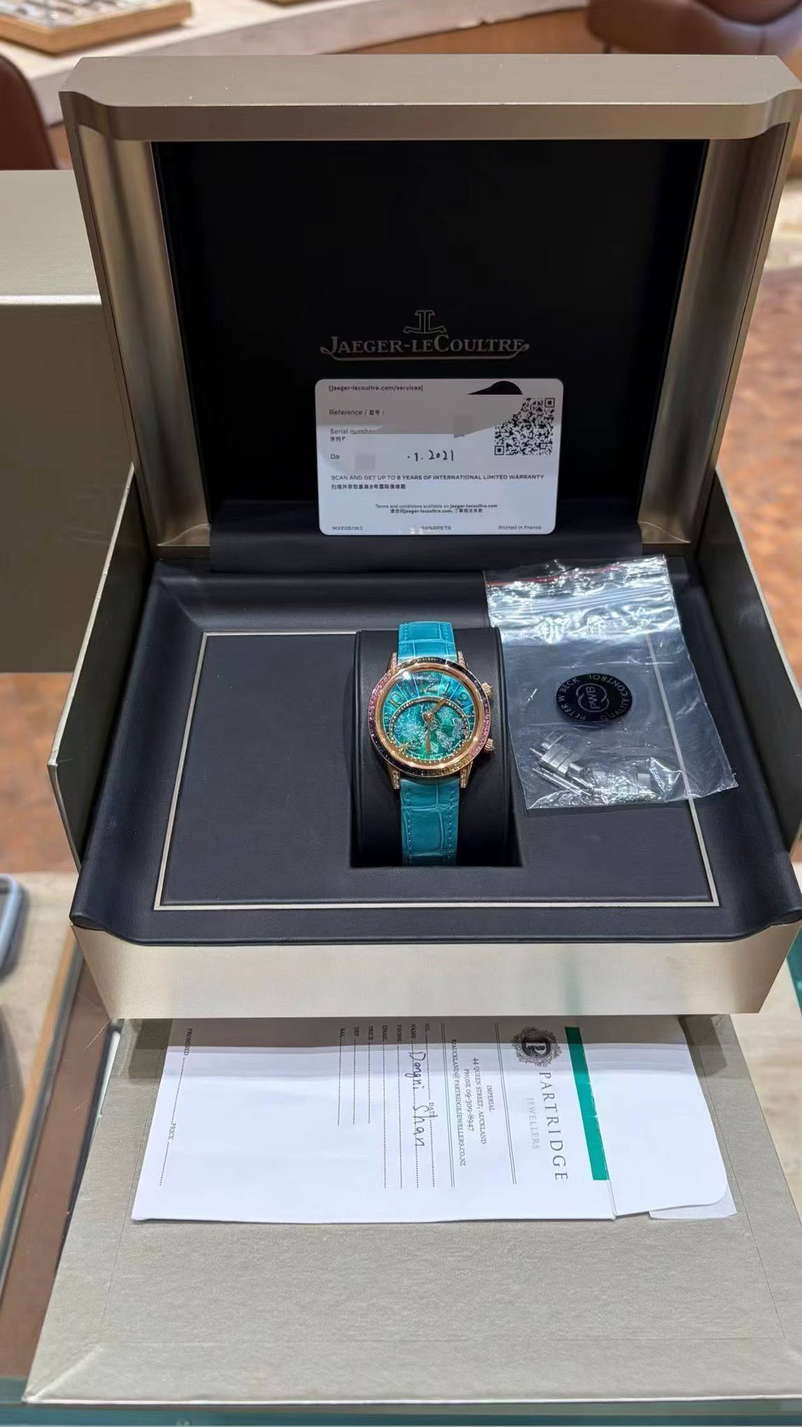 May be an image of wrist watch and text