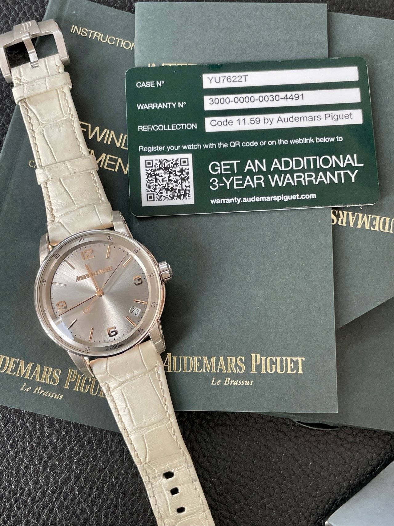 May be an image of digital watch and text that says 'INSTRUCTION CASE N° YU7622T Audemars Piguet Code 11 .59 WARRANTYN N° FWINL Register your watch with the QR code or on the…