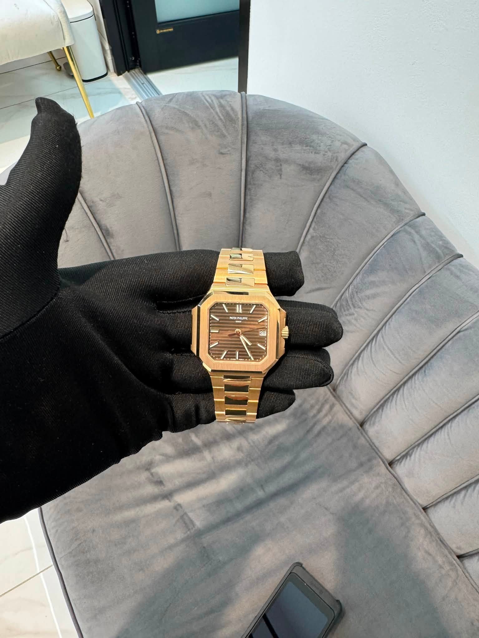 May be an image of wrist watch and text