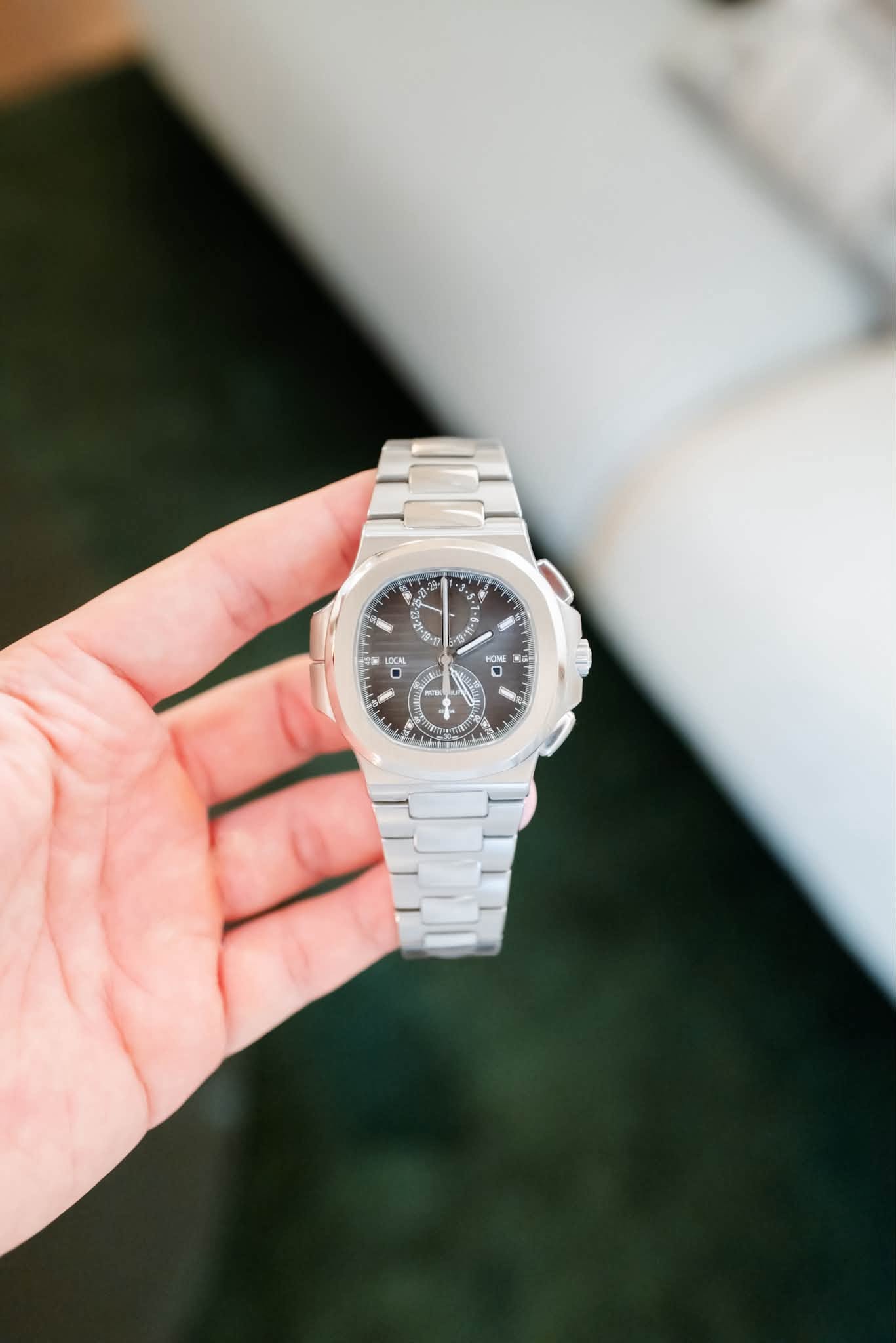 May be an image of wrist watch and text