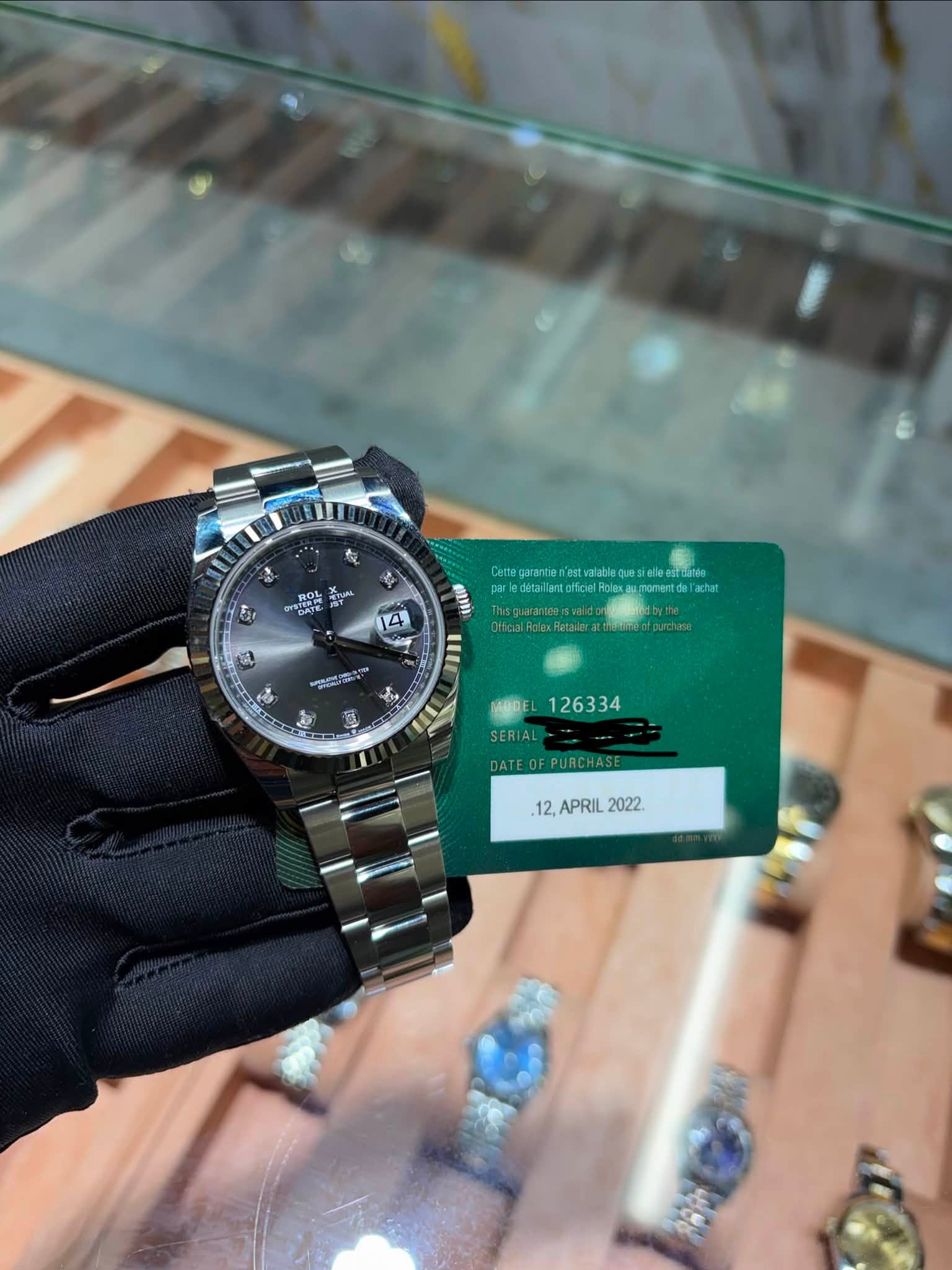 May be an image of wrist watch and text