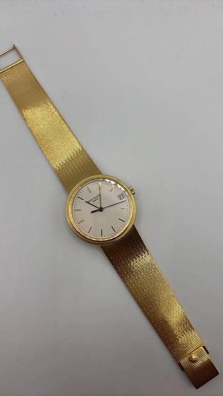May be an image of wrist watch