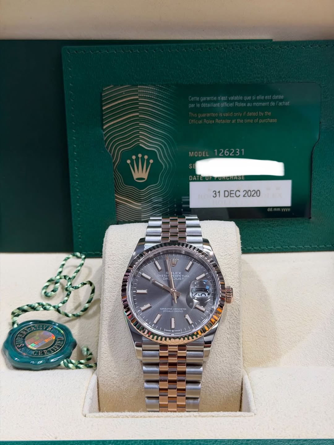 May be an image of wrist watch and text that says ' 31DEC2020 DEC 2020 STER עכן HL AO 173 SOKES'