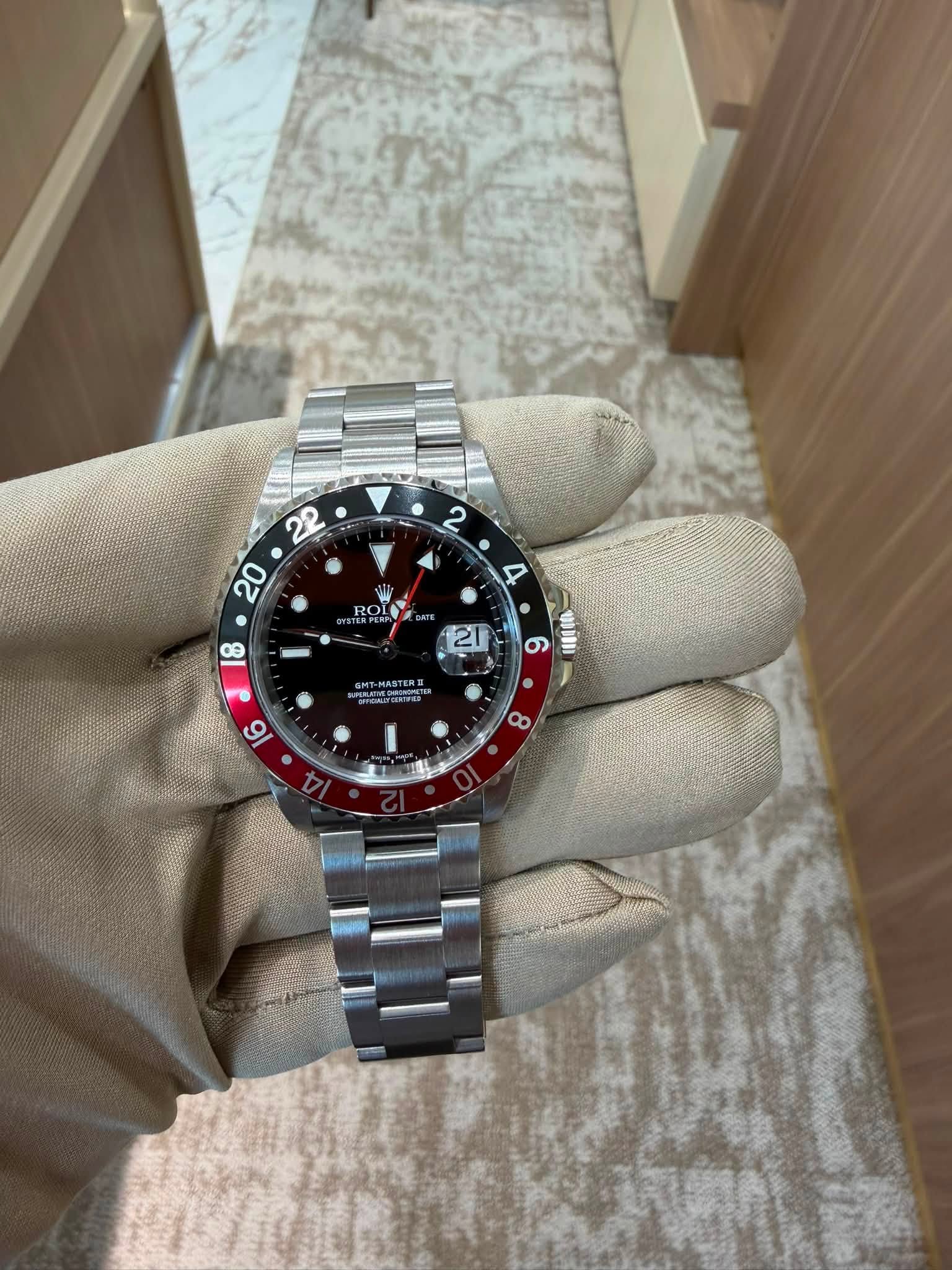 May be an image of wrist watch and text