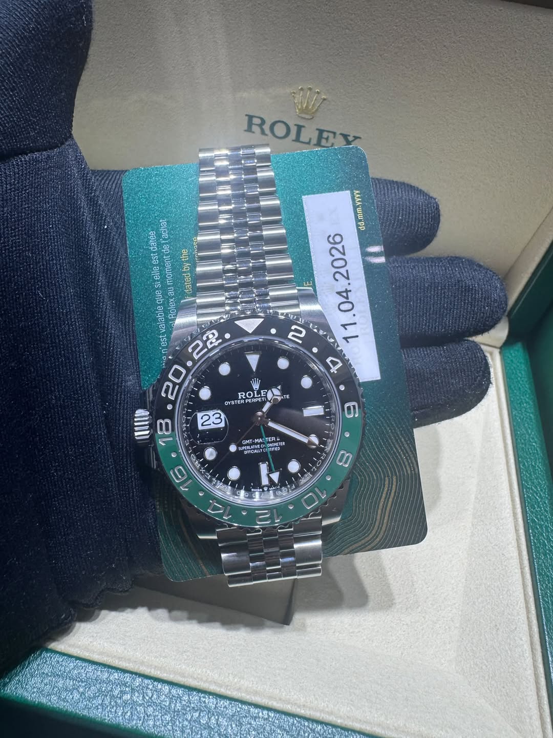 May be an image of wrist watch and text