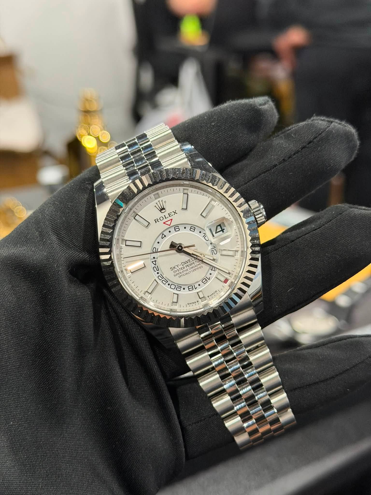 May be an image of wrist watch and text
