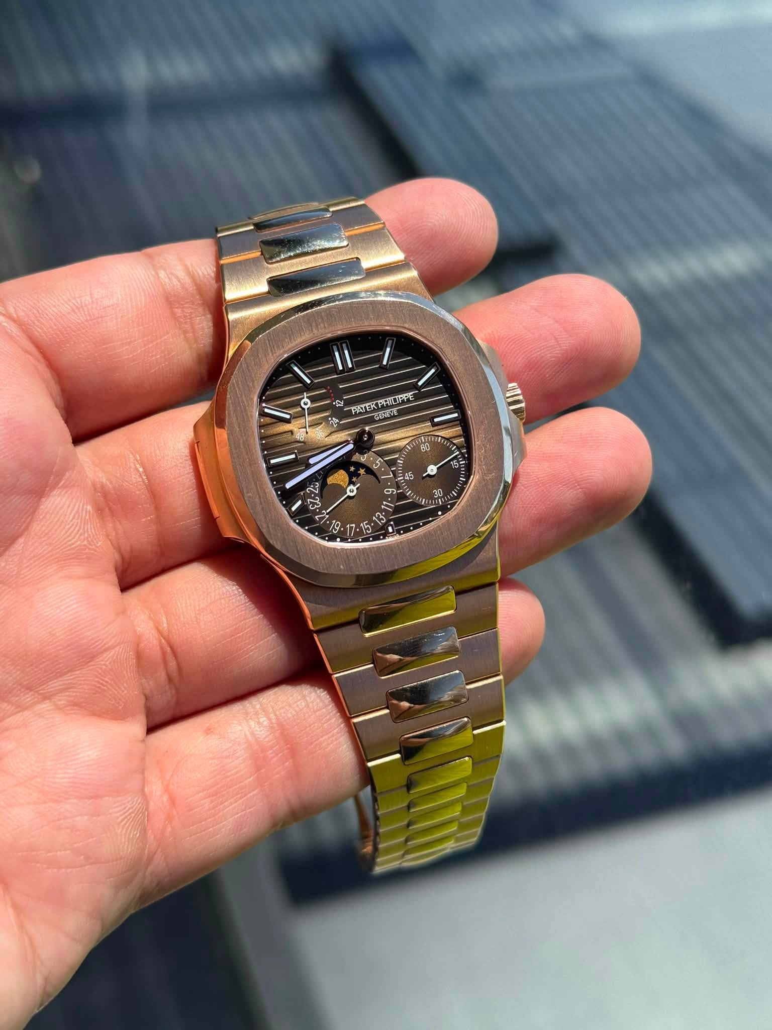 May be an image of wrist watch and text