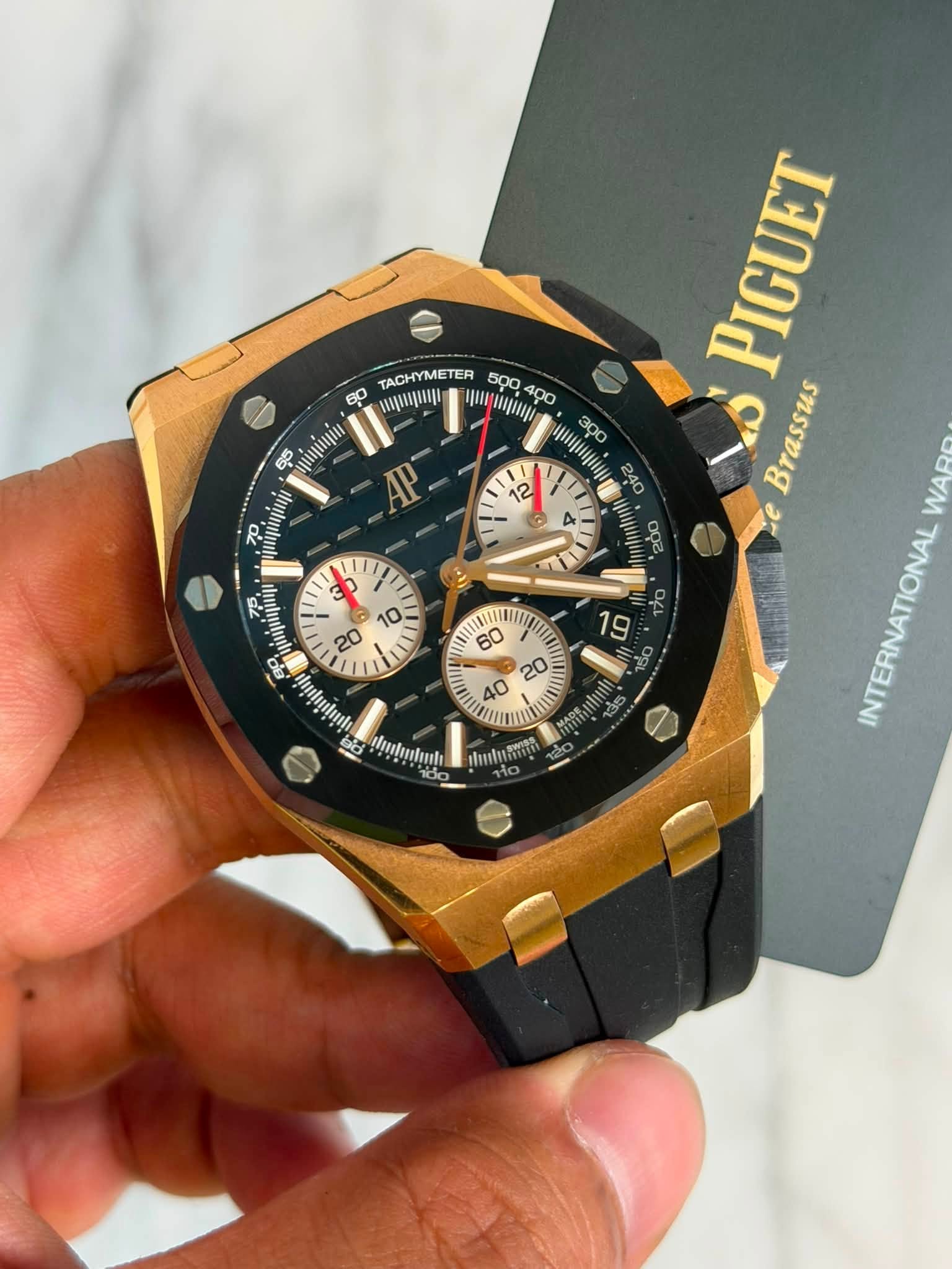 May be an image of wrist watch and text