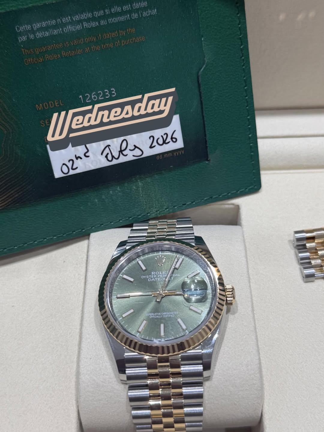 May be an image of wrist watch and text