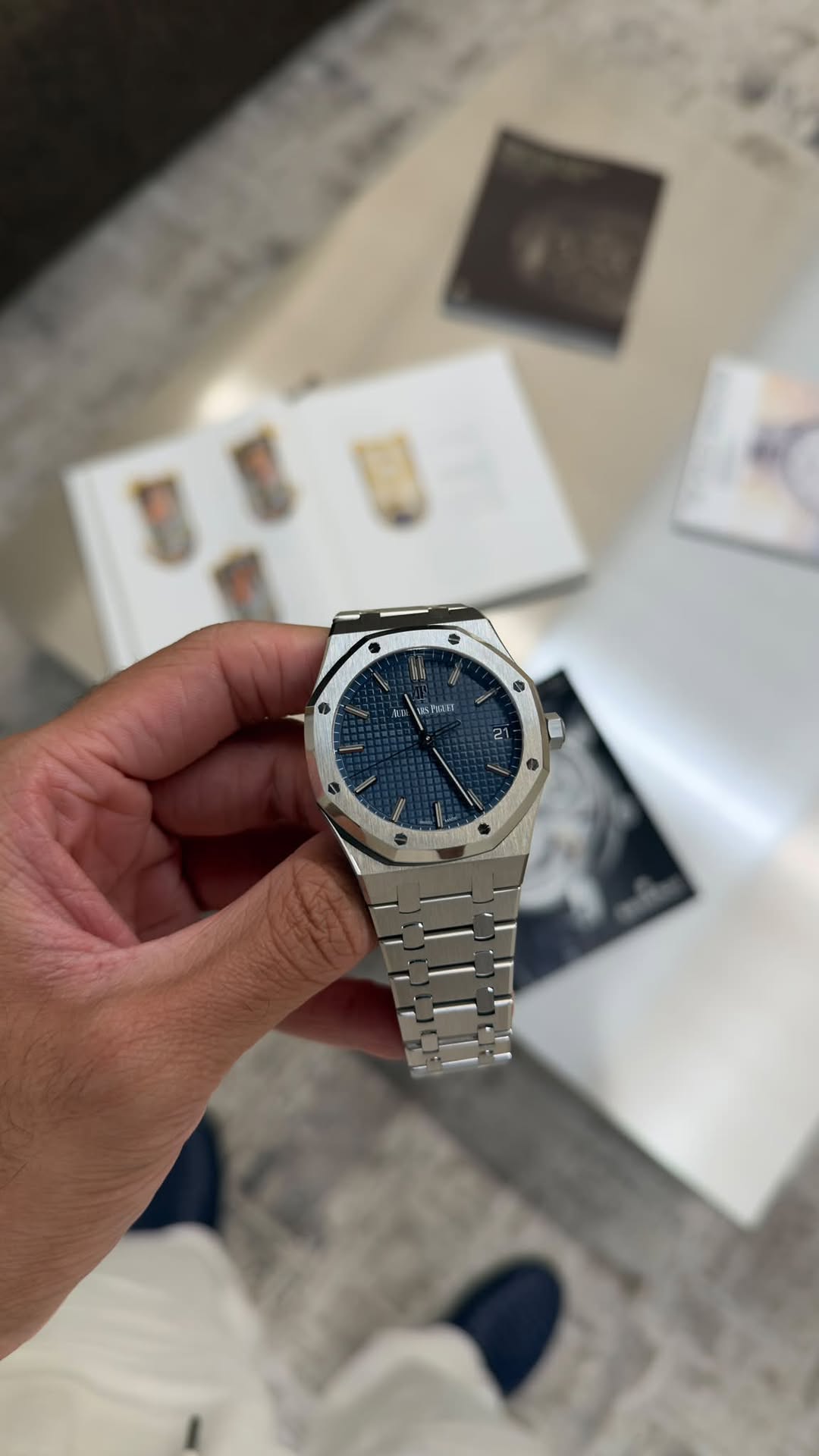 May be an image of wrist watch and text
