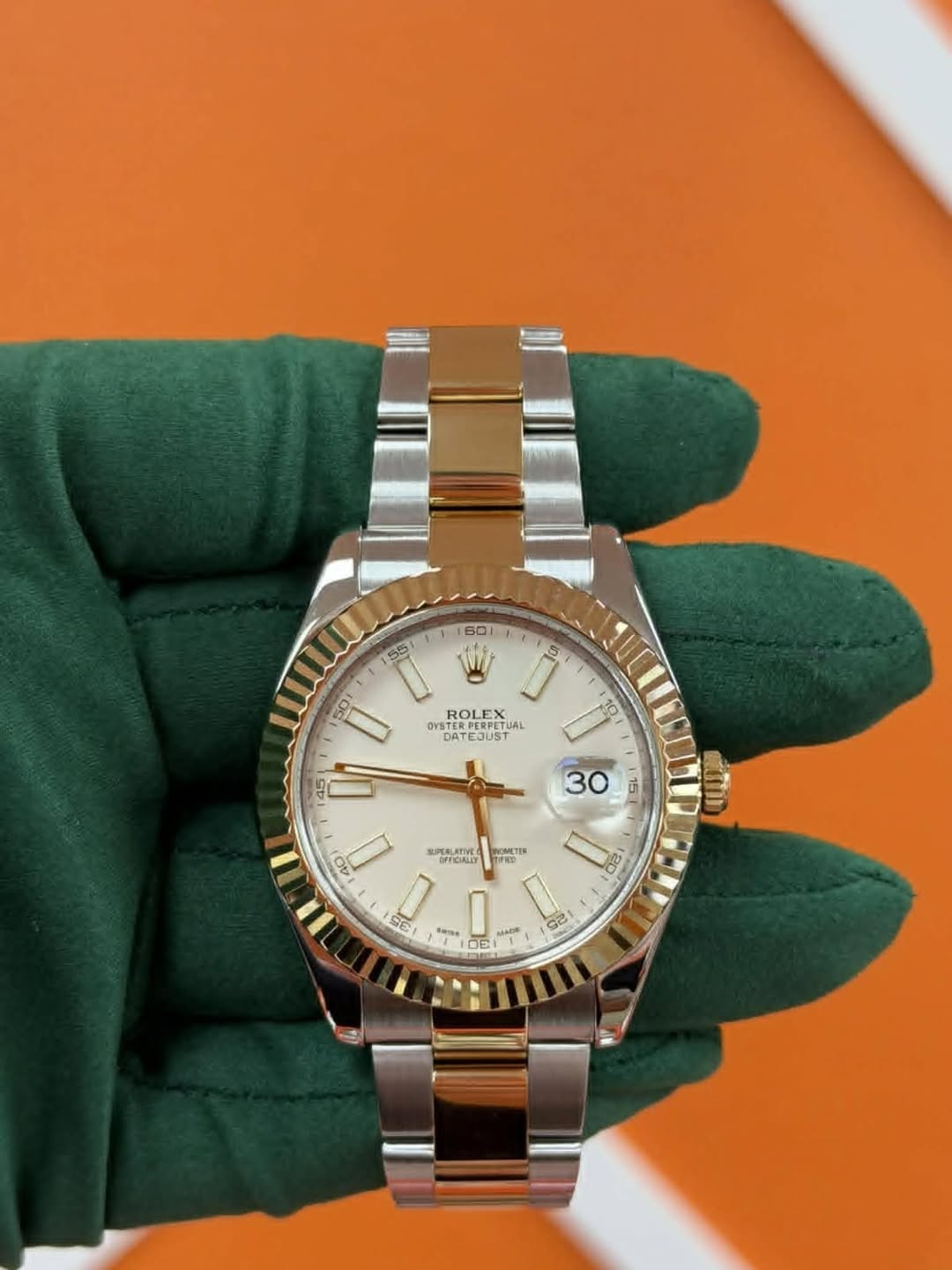 May be an image of wrist watch and text