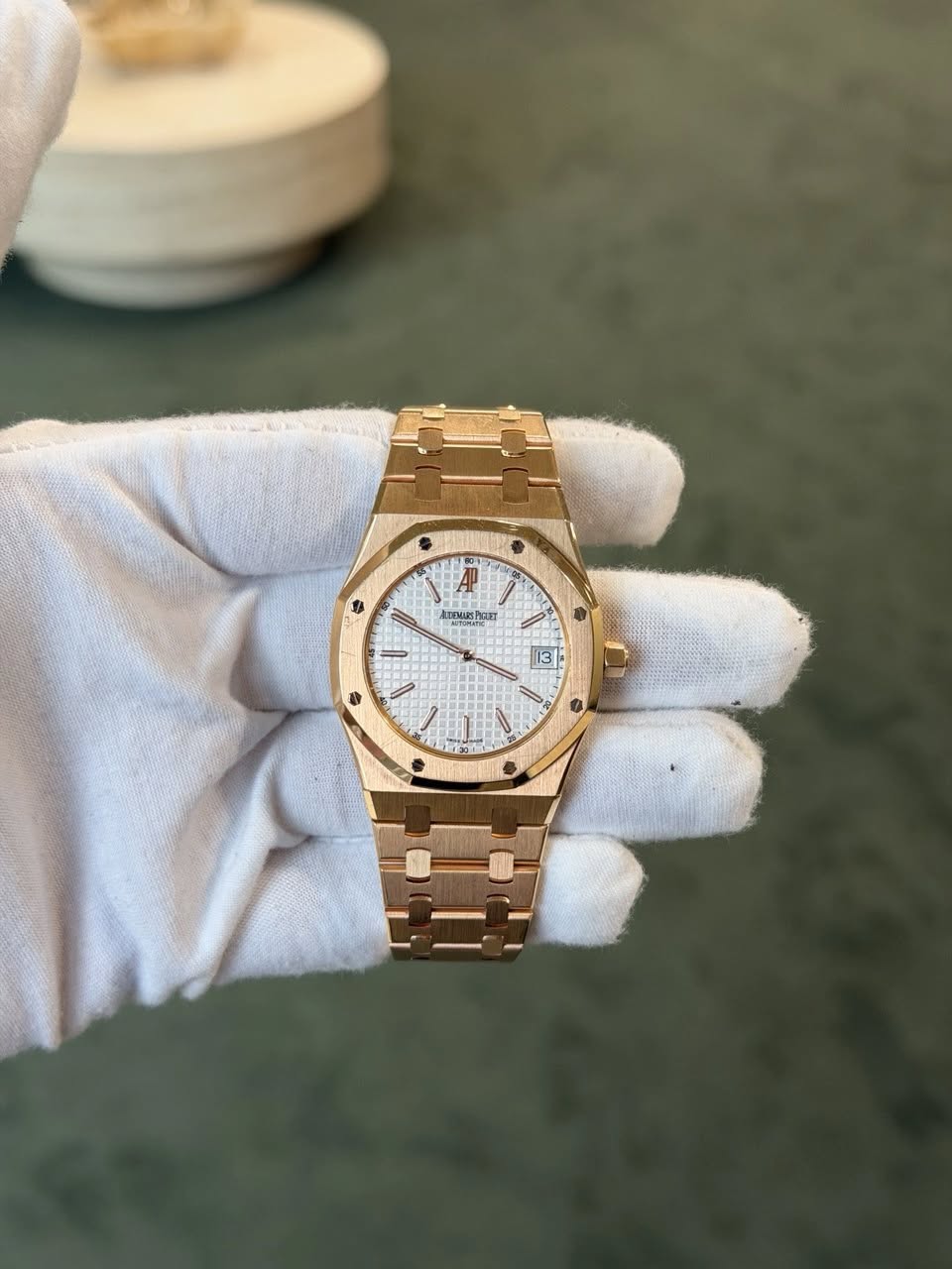 May be an image of wrist watch and text