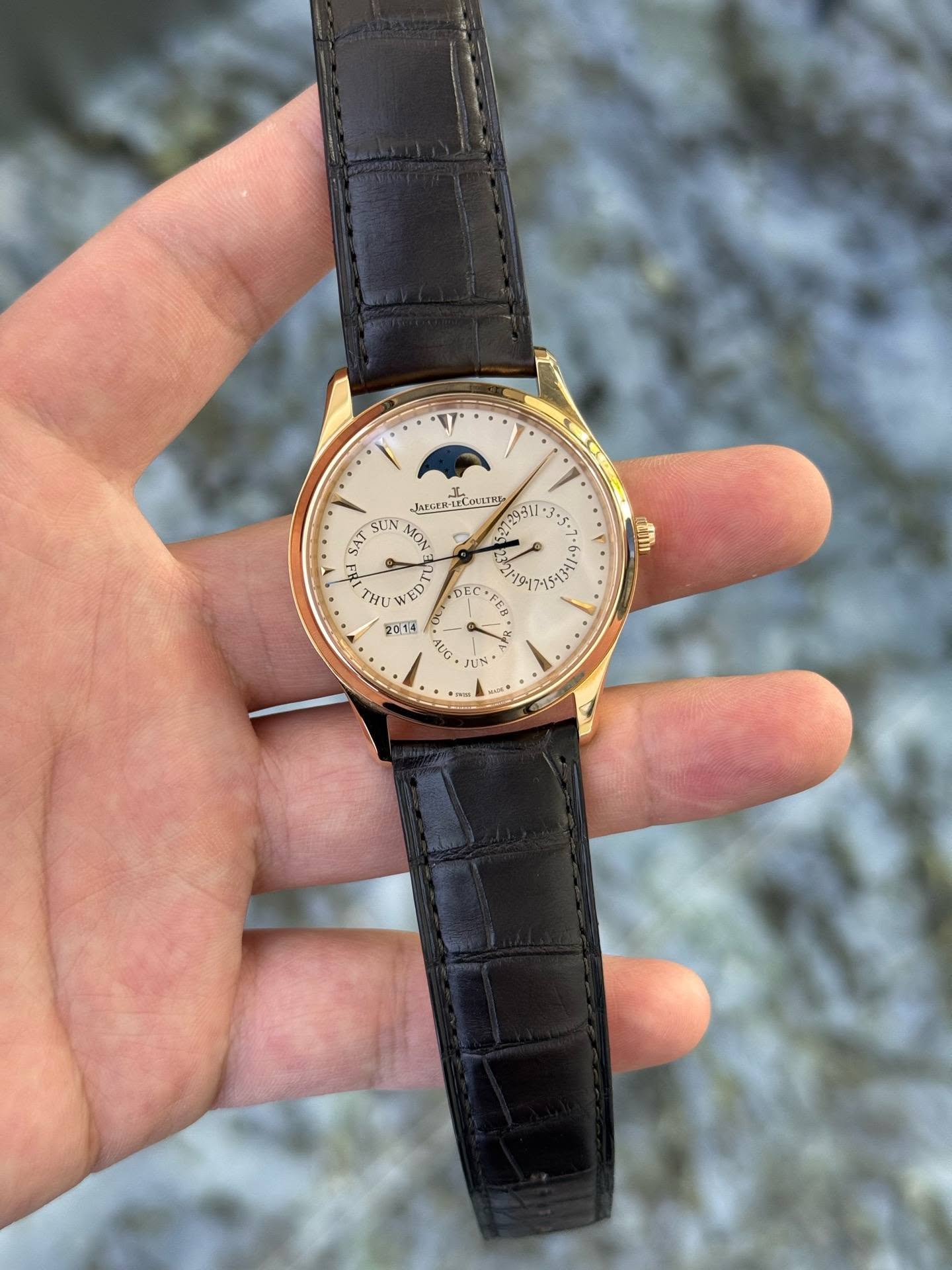 May be an image of wrist watch and text