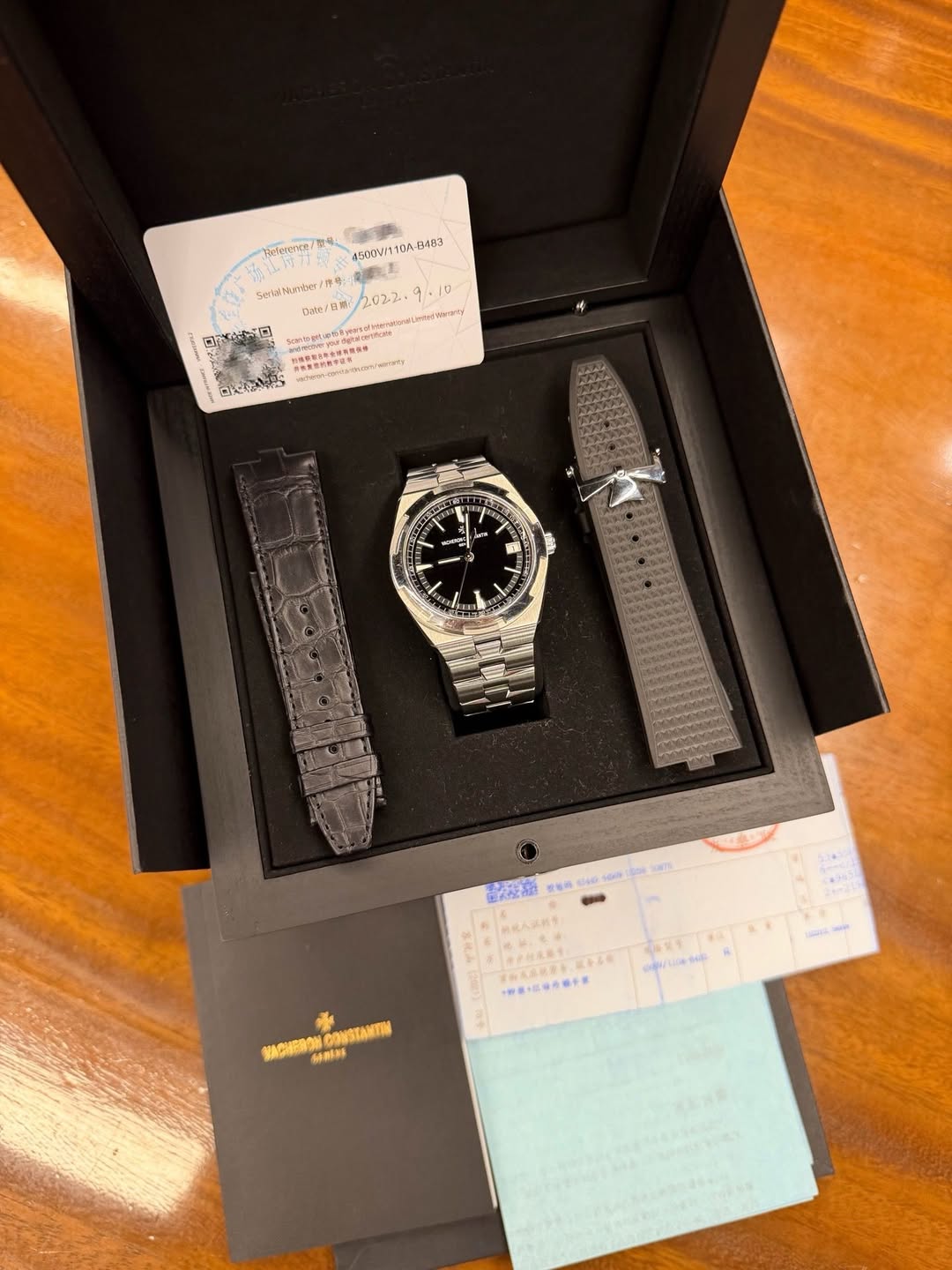 May be an image of wrist watch and text