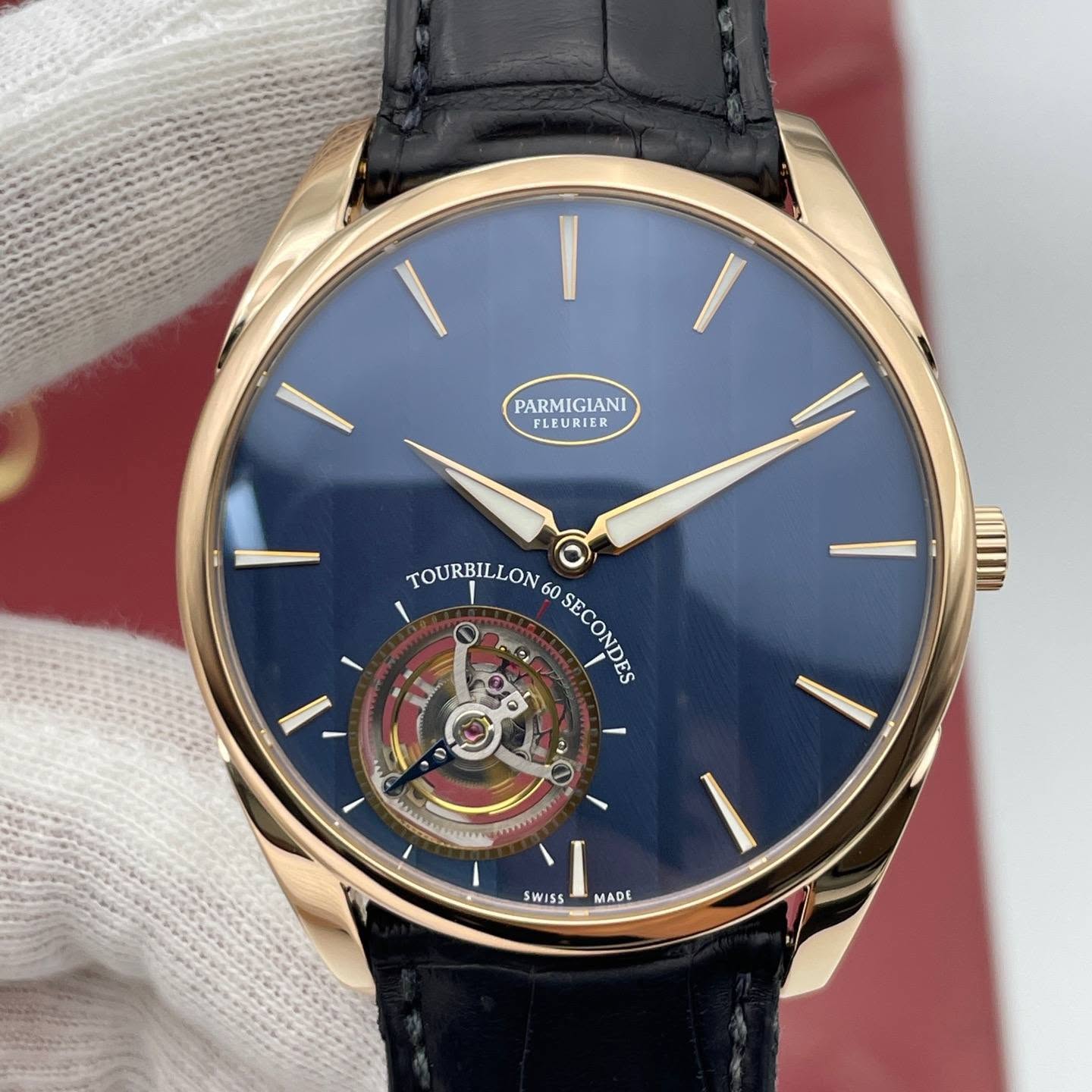 May be an image of wrist watch and text that says 'PARMIGIANI PARMIGIANI PLEURIER TOURBILLO 60 0 SECONOR SECONDES mW SWISS WISS MADE'