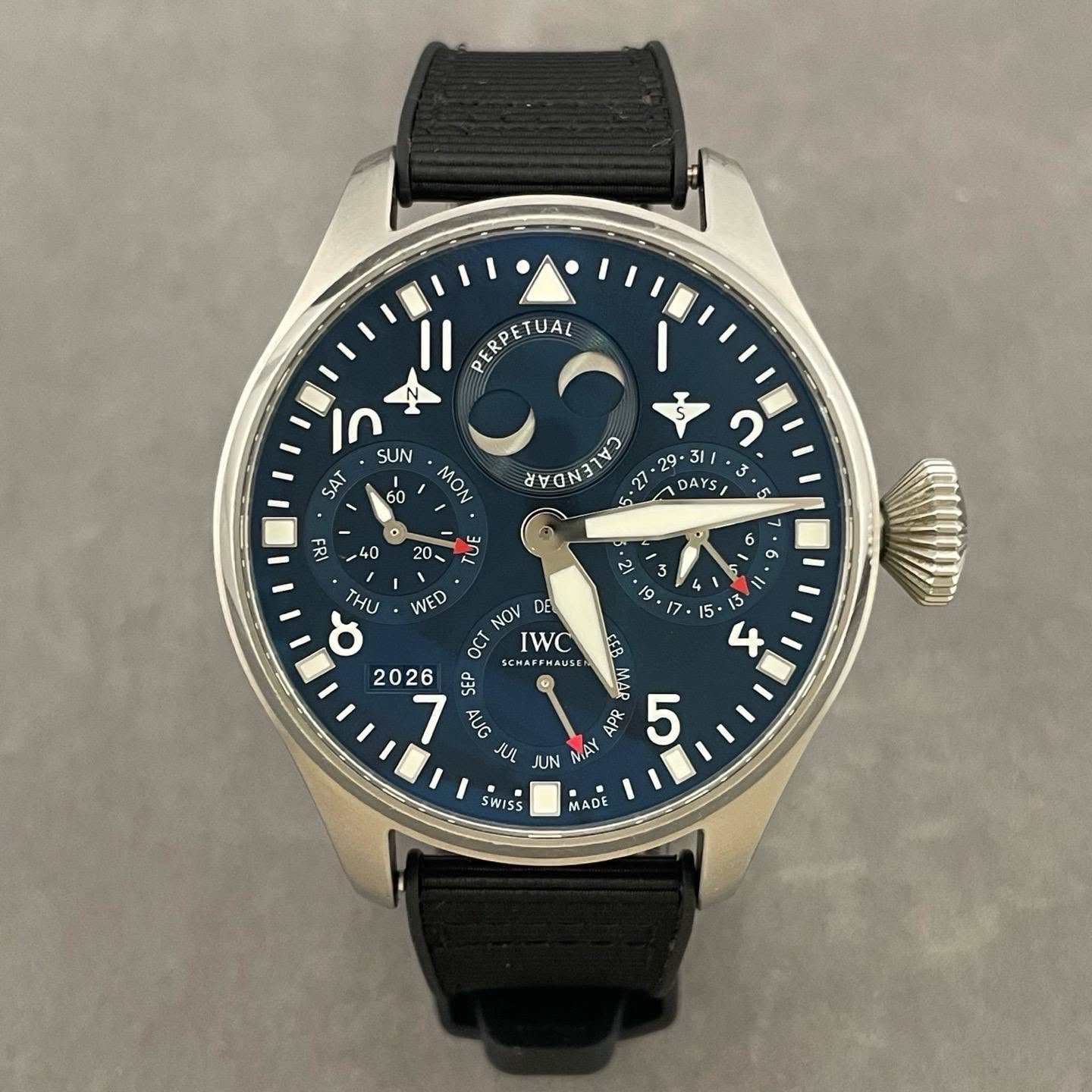 May be an image of wrist watch and text that says 'PERPETUAL AL ETUAL In SUN SAT 60 MON A DA AYS G8 o 40 20、 ሞ THU WED NOV OCι IWC 2026 b - 5 ن 1 M 1 15 15 ሂ 20 E5S AUG APR a 5…