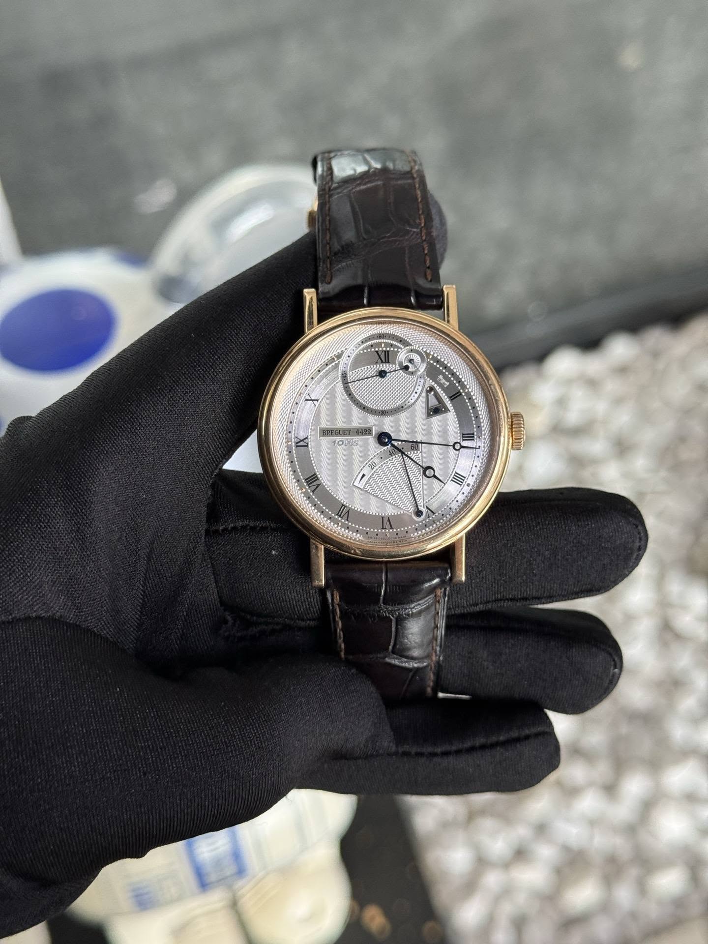 May be an image of wrist watch and text