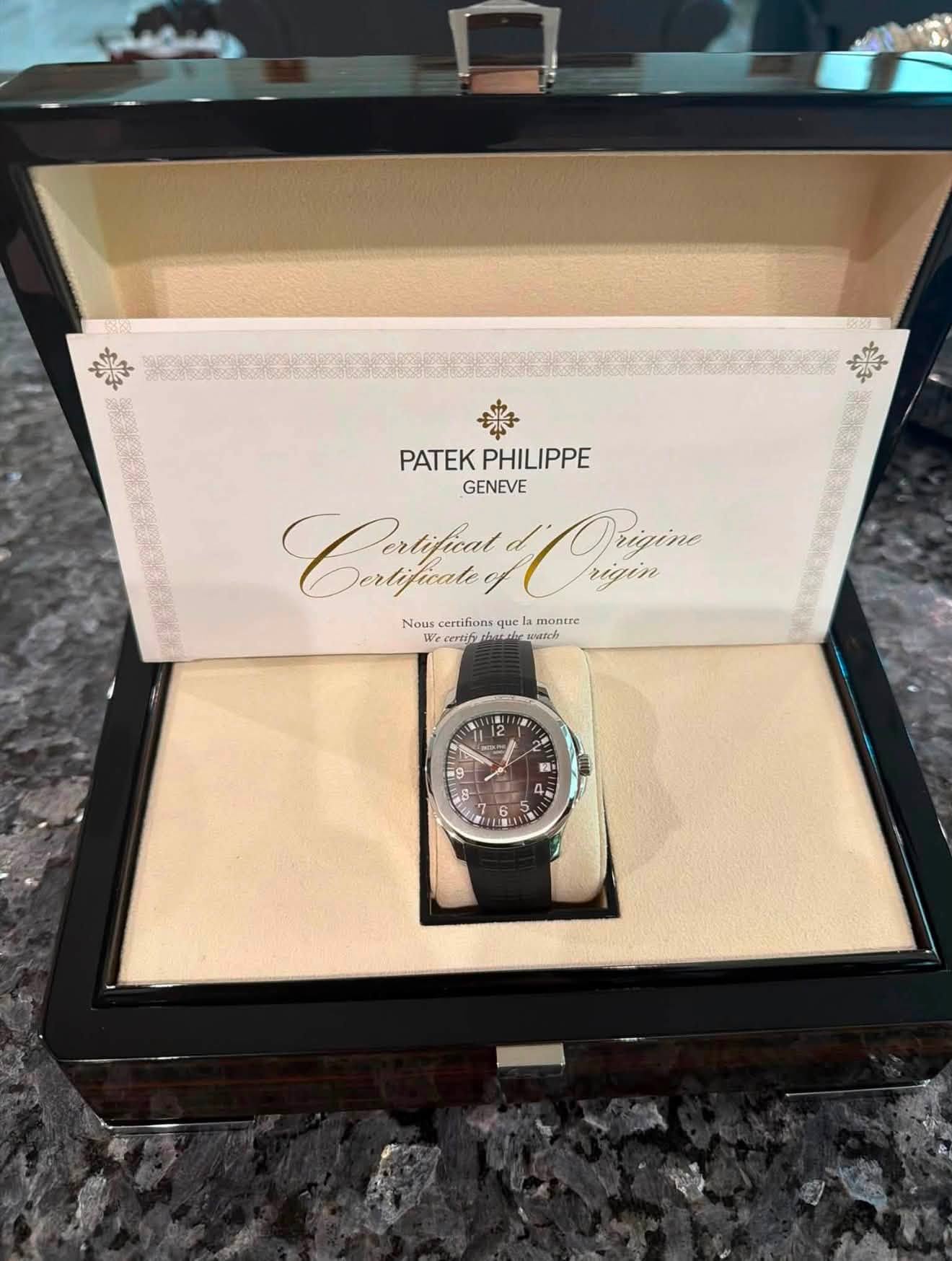 May be an image of wrist watch and text