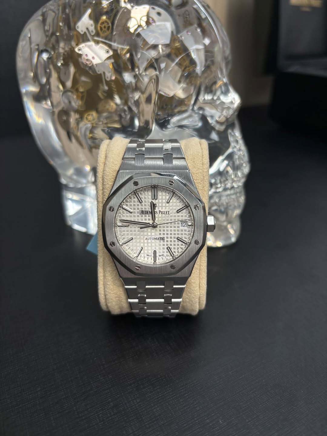 May be an image of wrist watch and text
