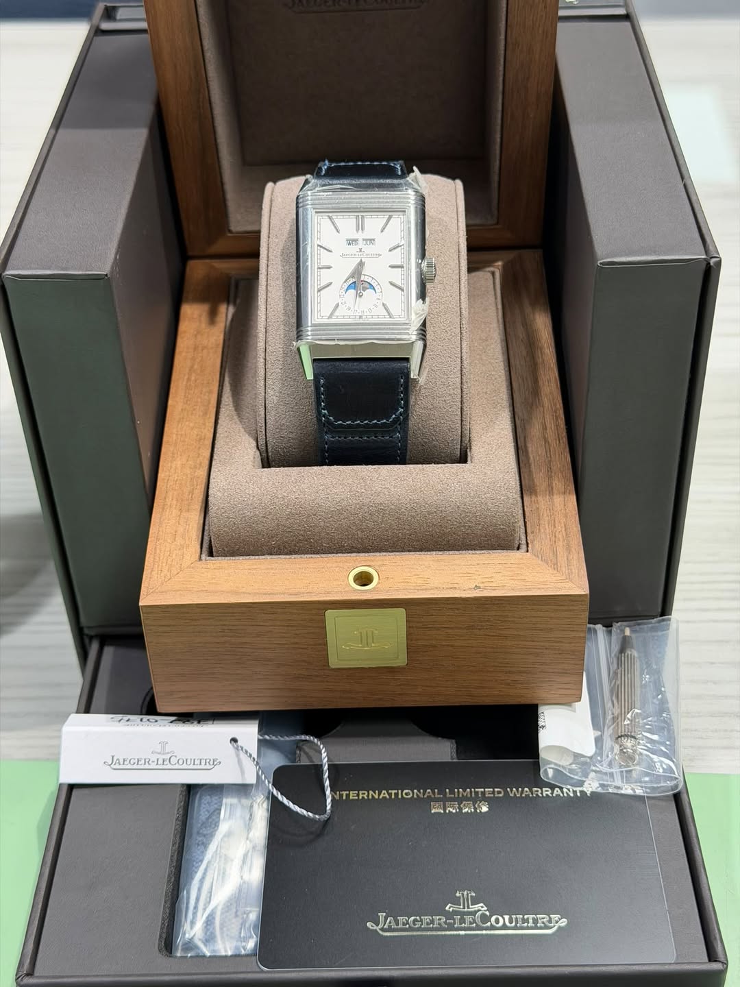 May be an image of wrist watch and text