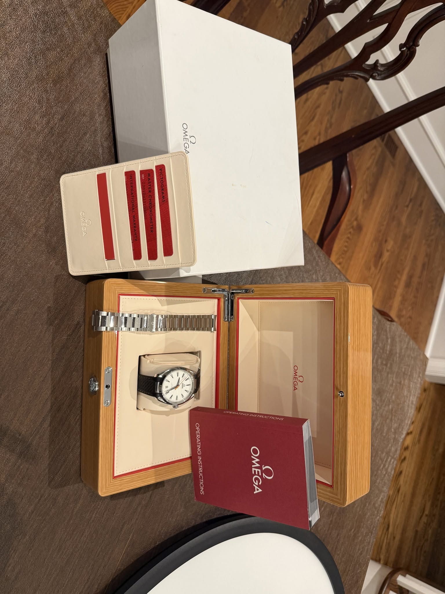 May be an image of wrist watch and text