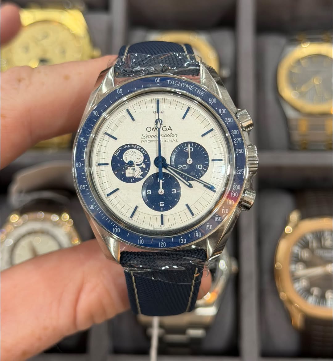 May be an image of wrist watch and text that says '55 o 60 TACHYMET RE ۱ من OMEGA EGA Sneee αό PAOrE pRorE BIDNAL 50 NNIVERS 3P 250 と 20 85+ ၀ 70 60 เ5ิ0 140 중· 120 130'
