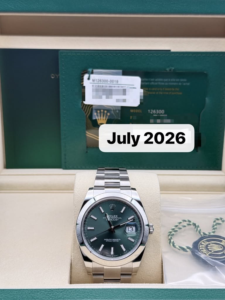 May be an image of wrist watch and text that says 'M126300-0010 2含 D - 126300 July July2026 2026 OLEX و 13 E ្ាះ'