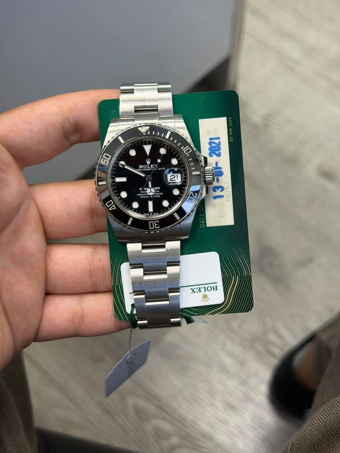 May be an image of wrist watch and text