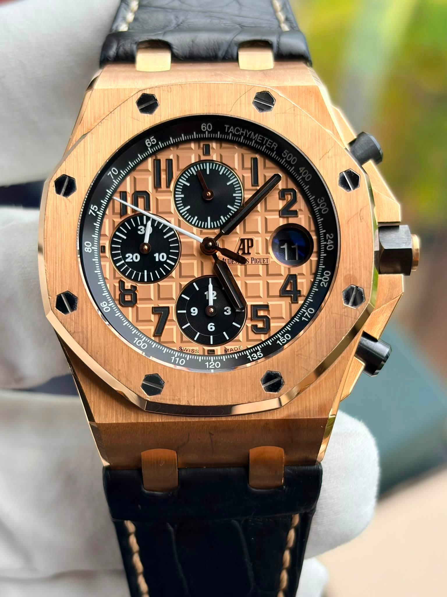 May be an image of wrist watch and text
