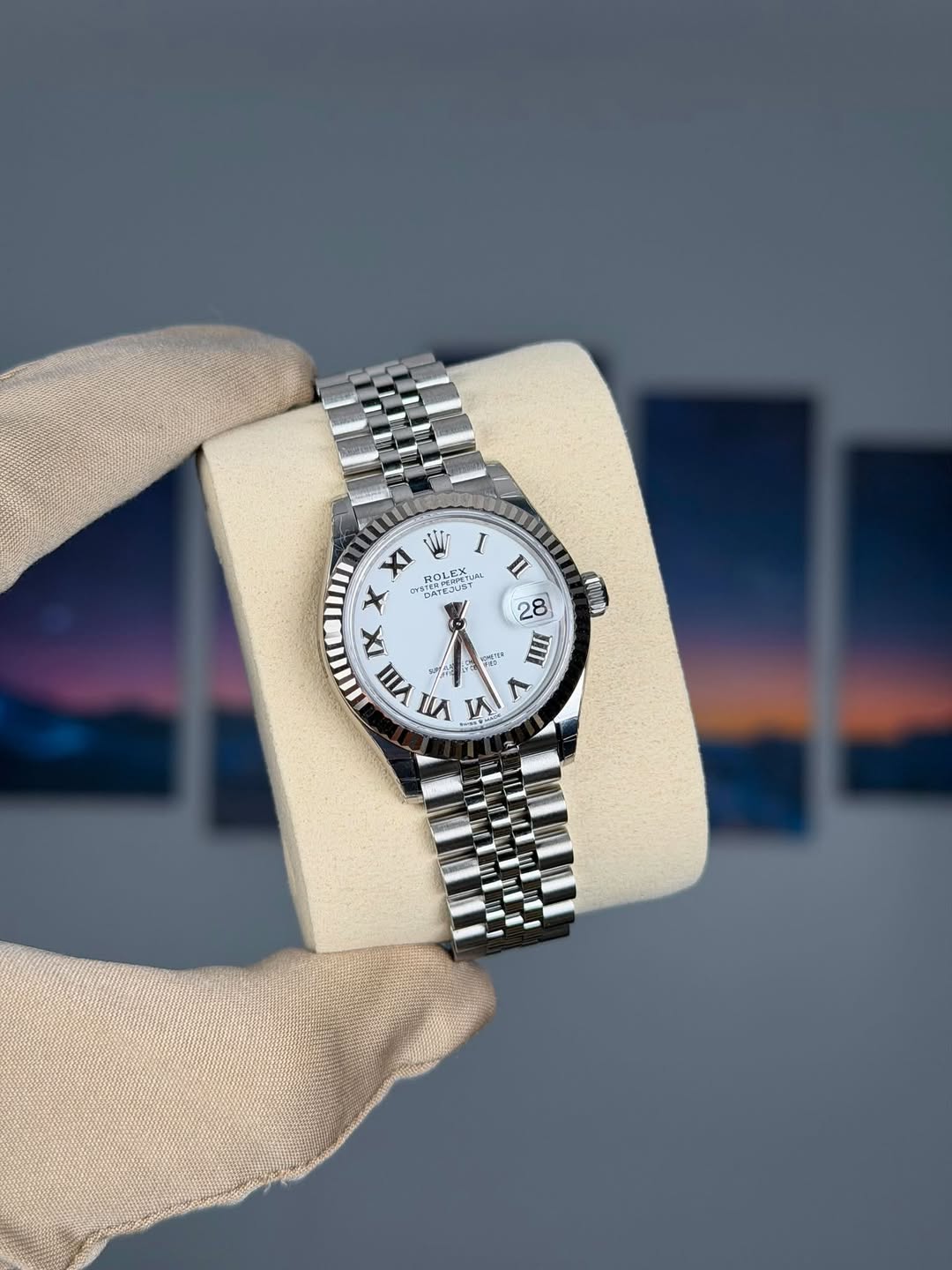 May be an image of wrist watch and text