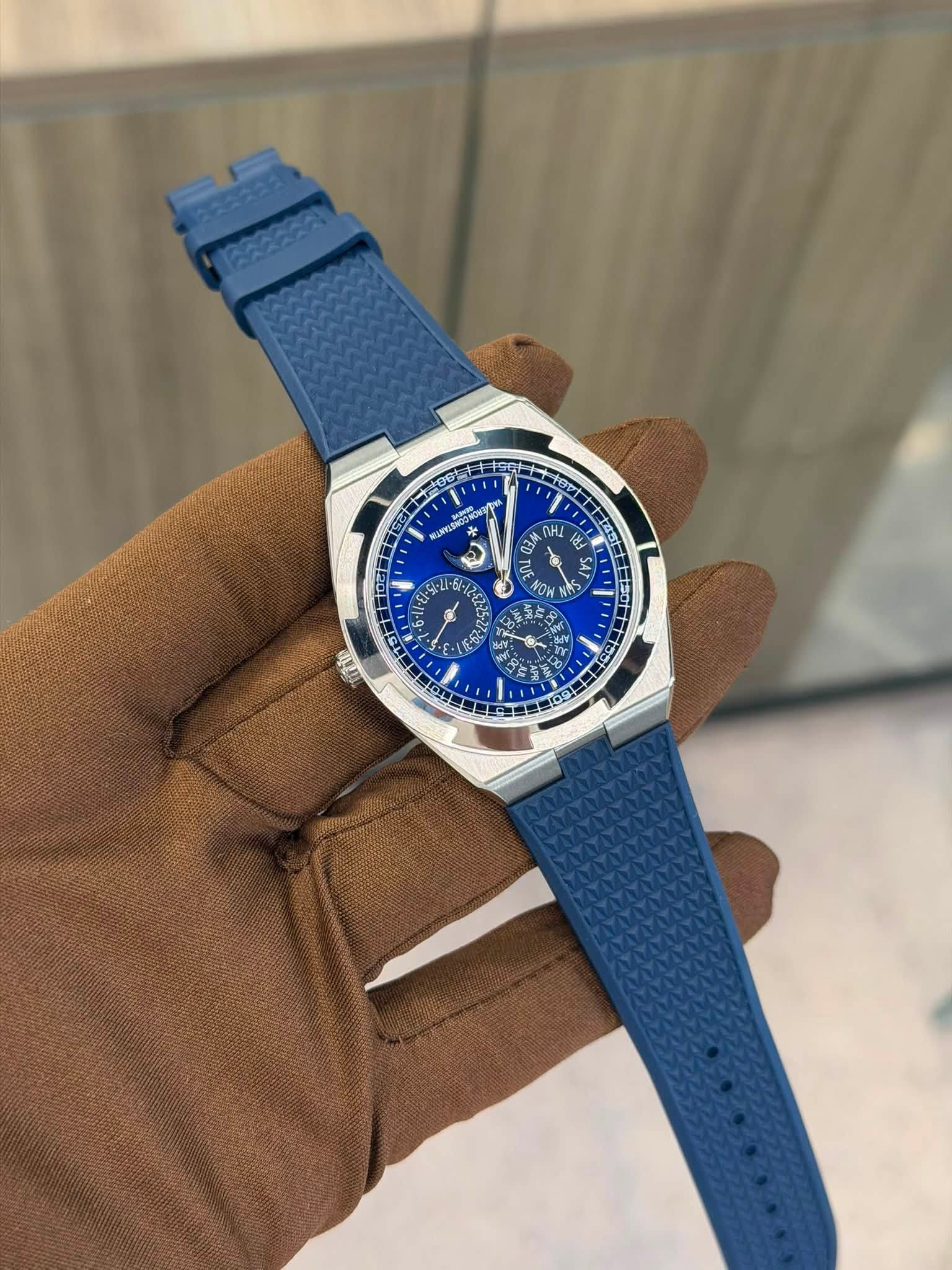 May be an image of wrist watch and text