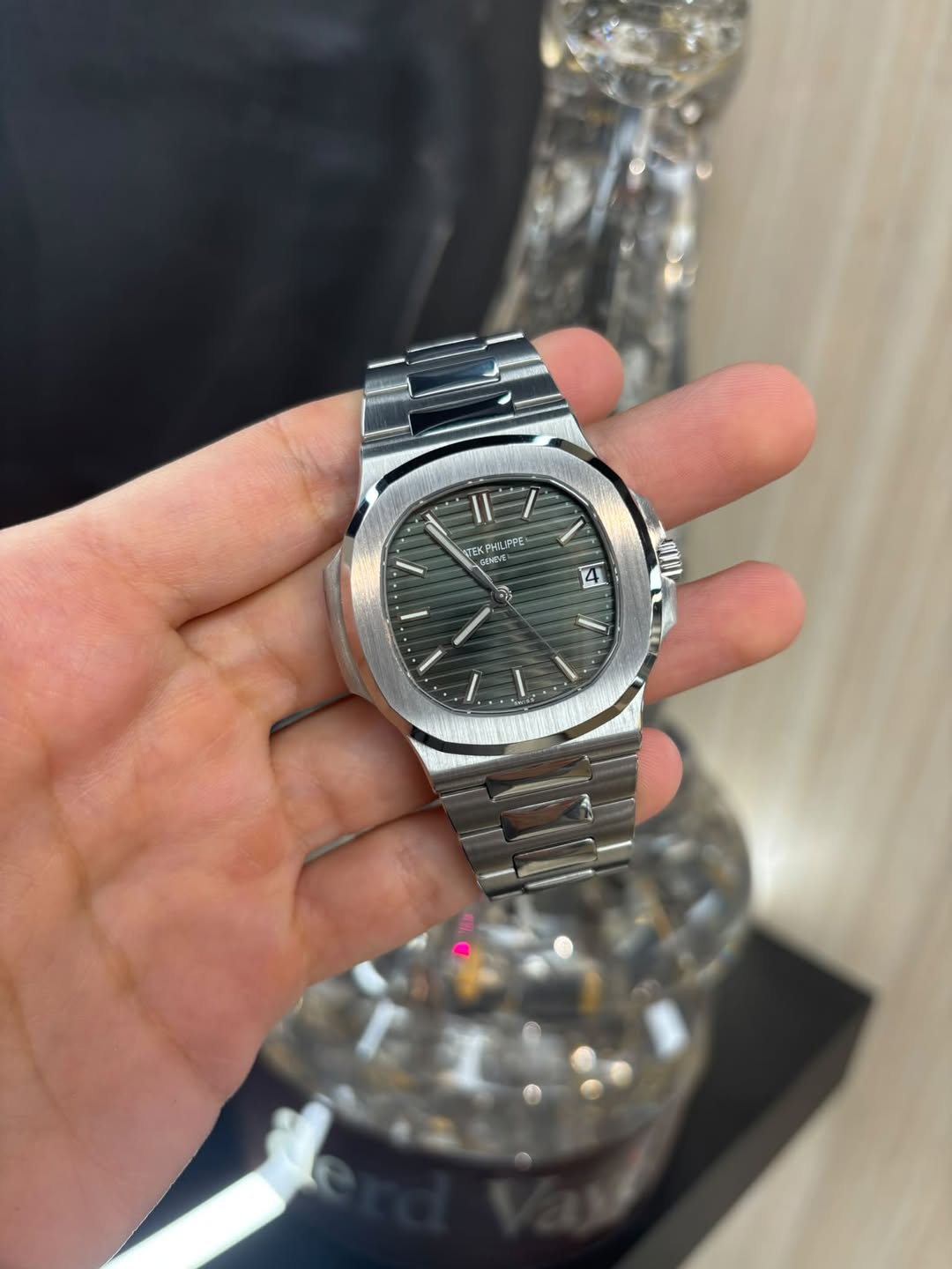 May be an image of wrist watch and text