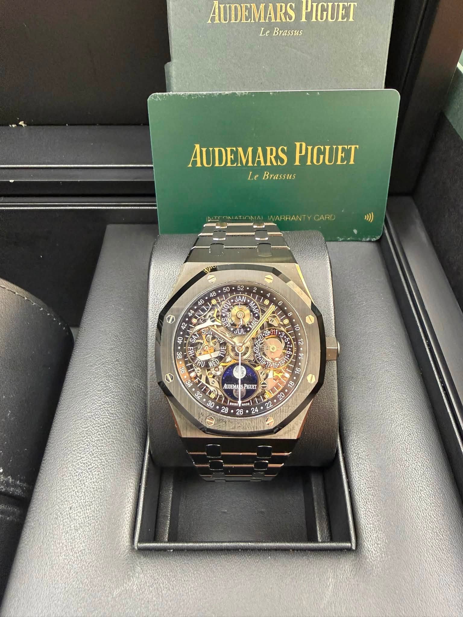 May be an image of wrist watch and text that says 'AUDEMARS PIGUET Le Brassus AUDEMARS PIGUET Le Brassus VARRANTY CARD ) 50 9 山 新門 PREART 9L 8L 0 26'