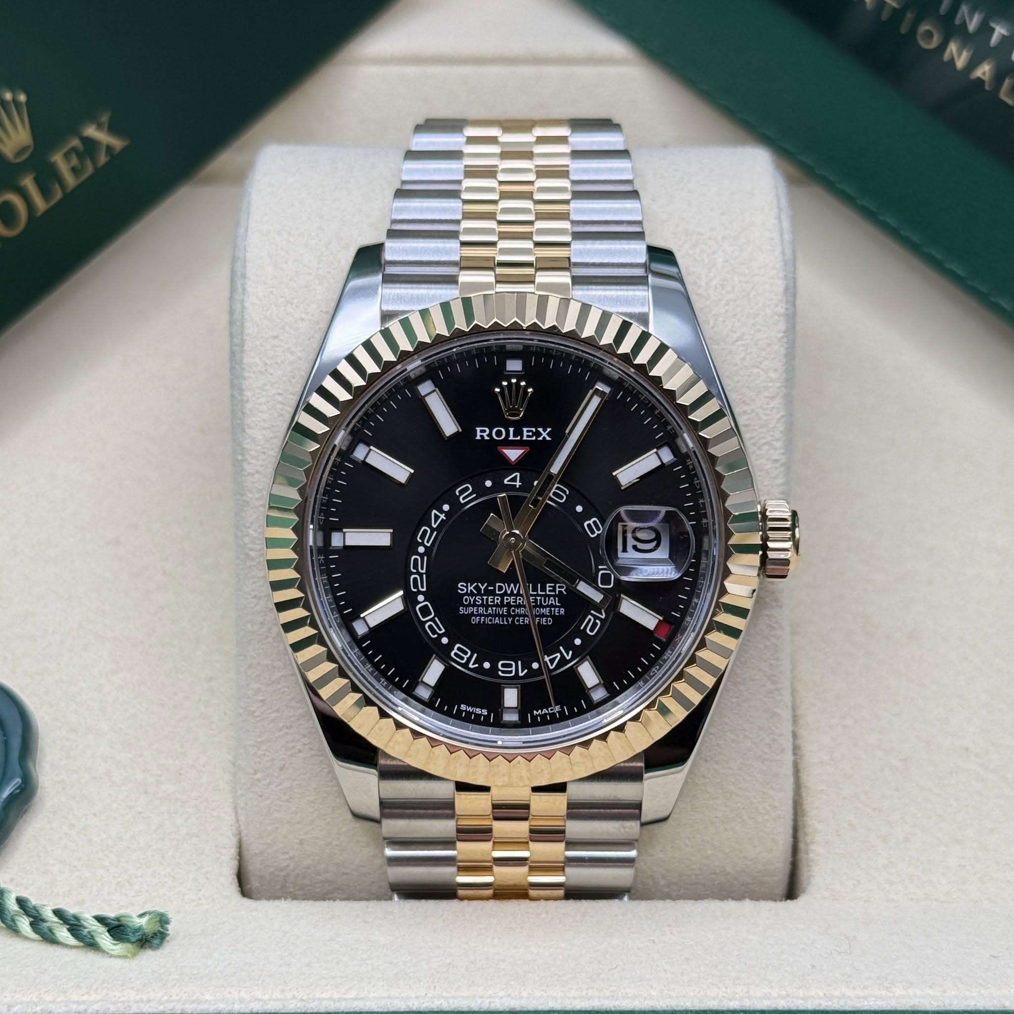 May be an image of wrist watch and text
