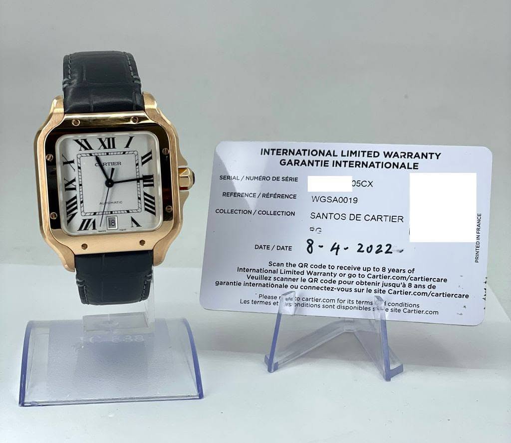 May be an image of digital watch and text that says 'XI XII XII RTIER INTERNATIONAL LIMITED WARRANTY GARANTIE INTERNATIONALE SERIAL SERIAL/NUMERODESERIE RIAL/NUMERODE NUMERO…