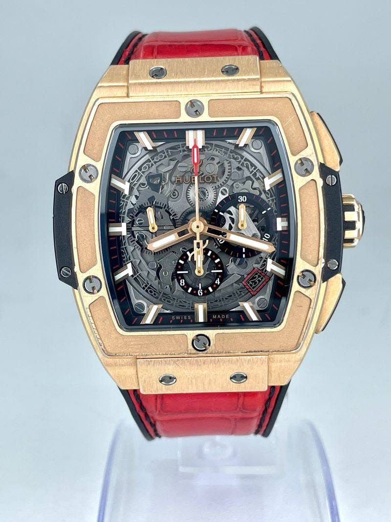 May be an image of wrist watch and text