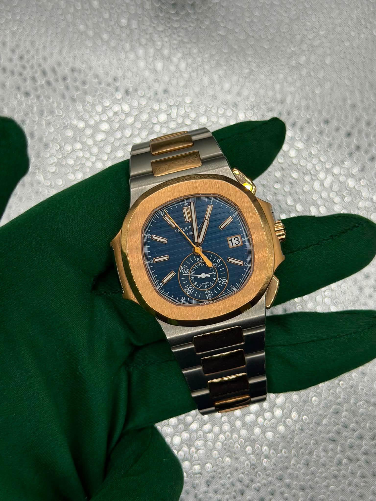May be an image of wrist watch and text