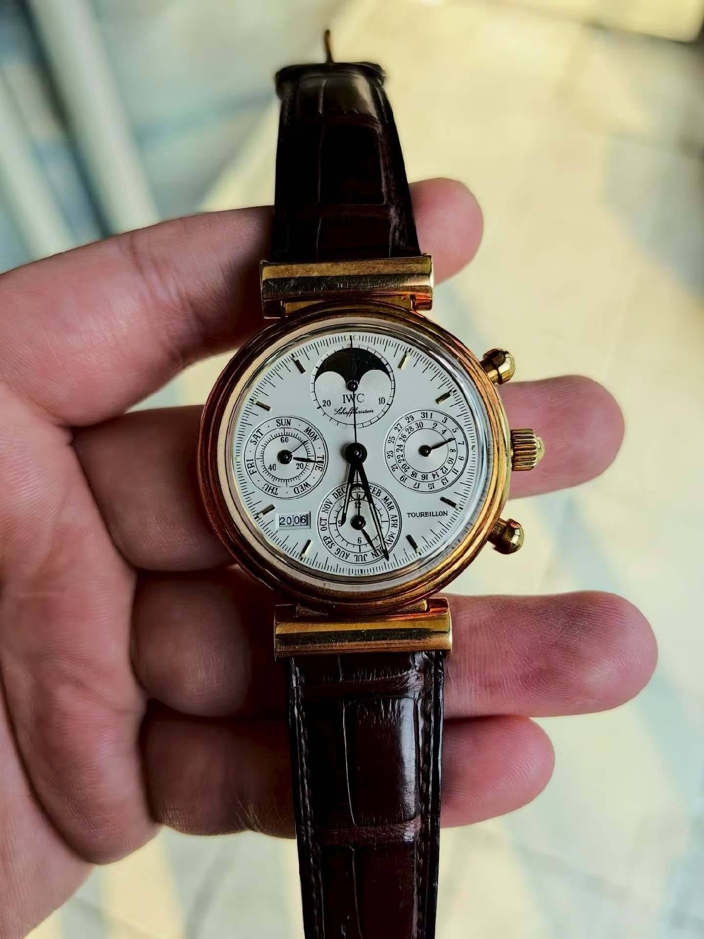 May be an image of wrist watch and text