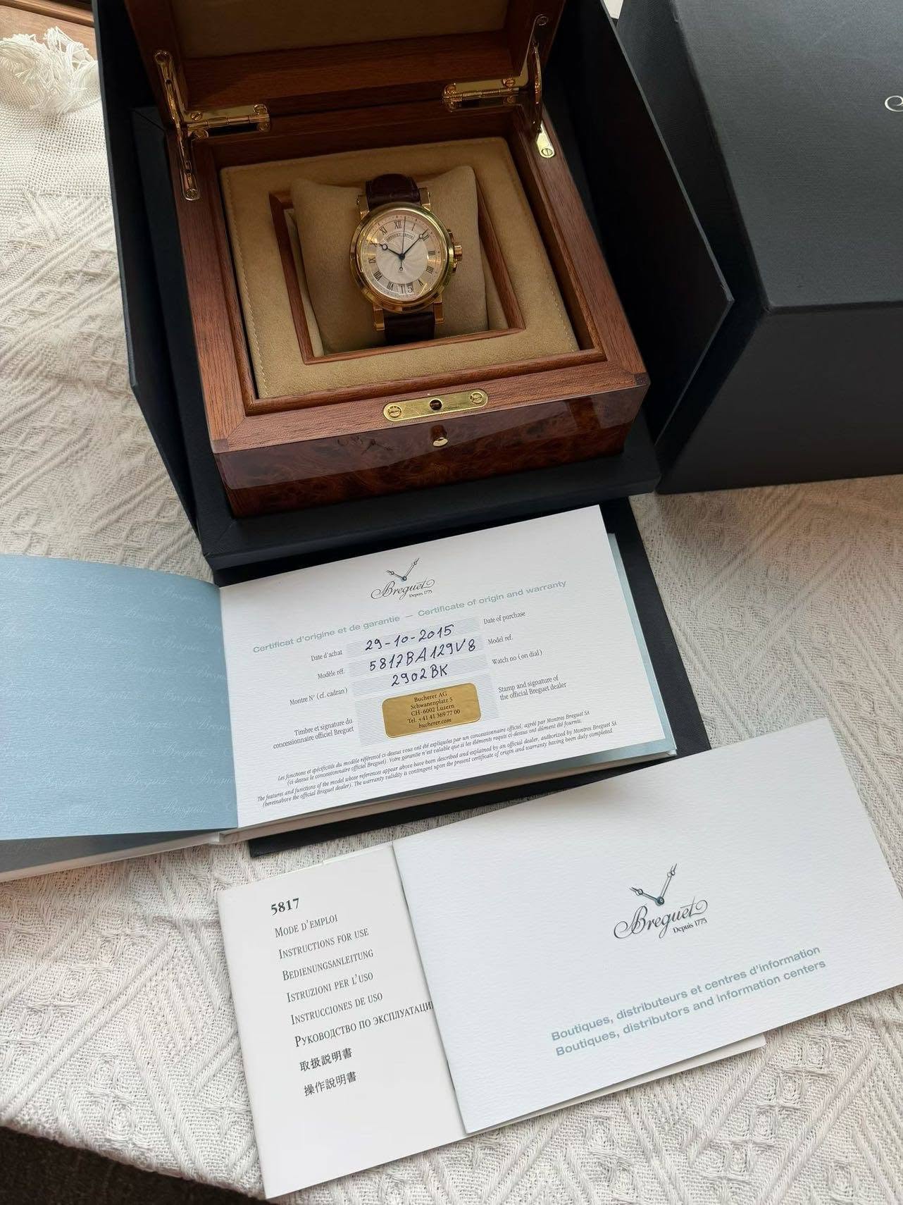 May be an image of wrist watch and text