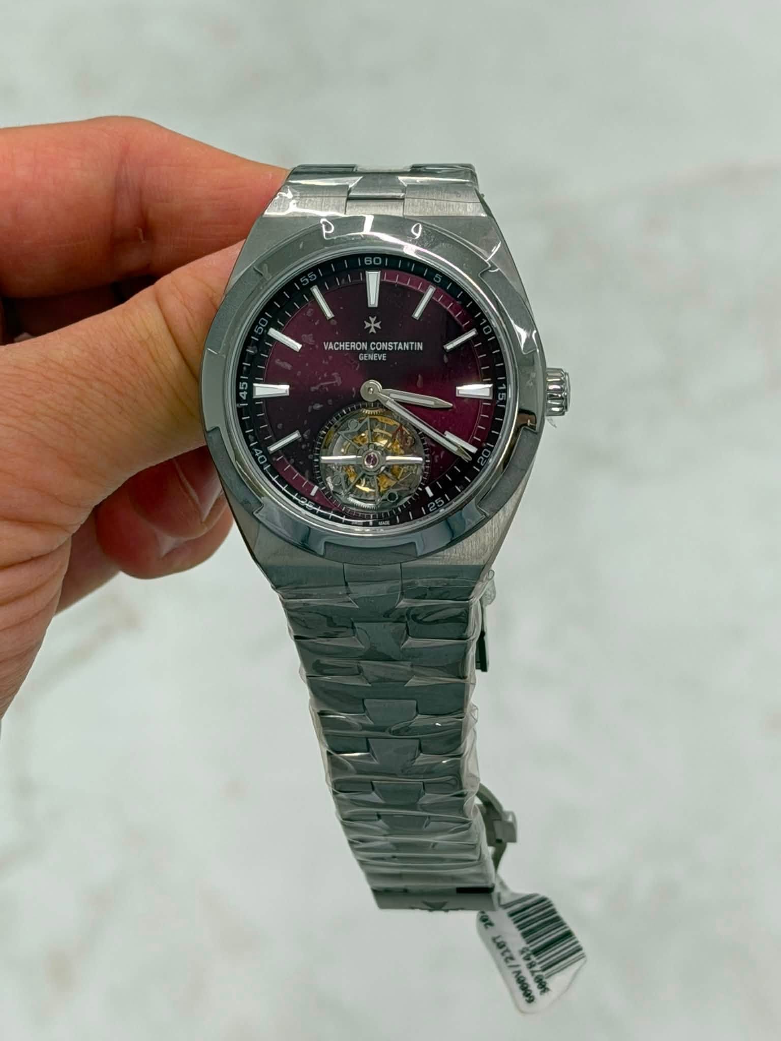 May be an image of wrist watch and text