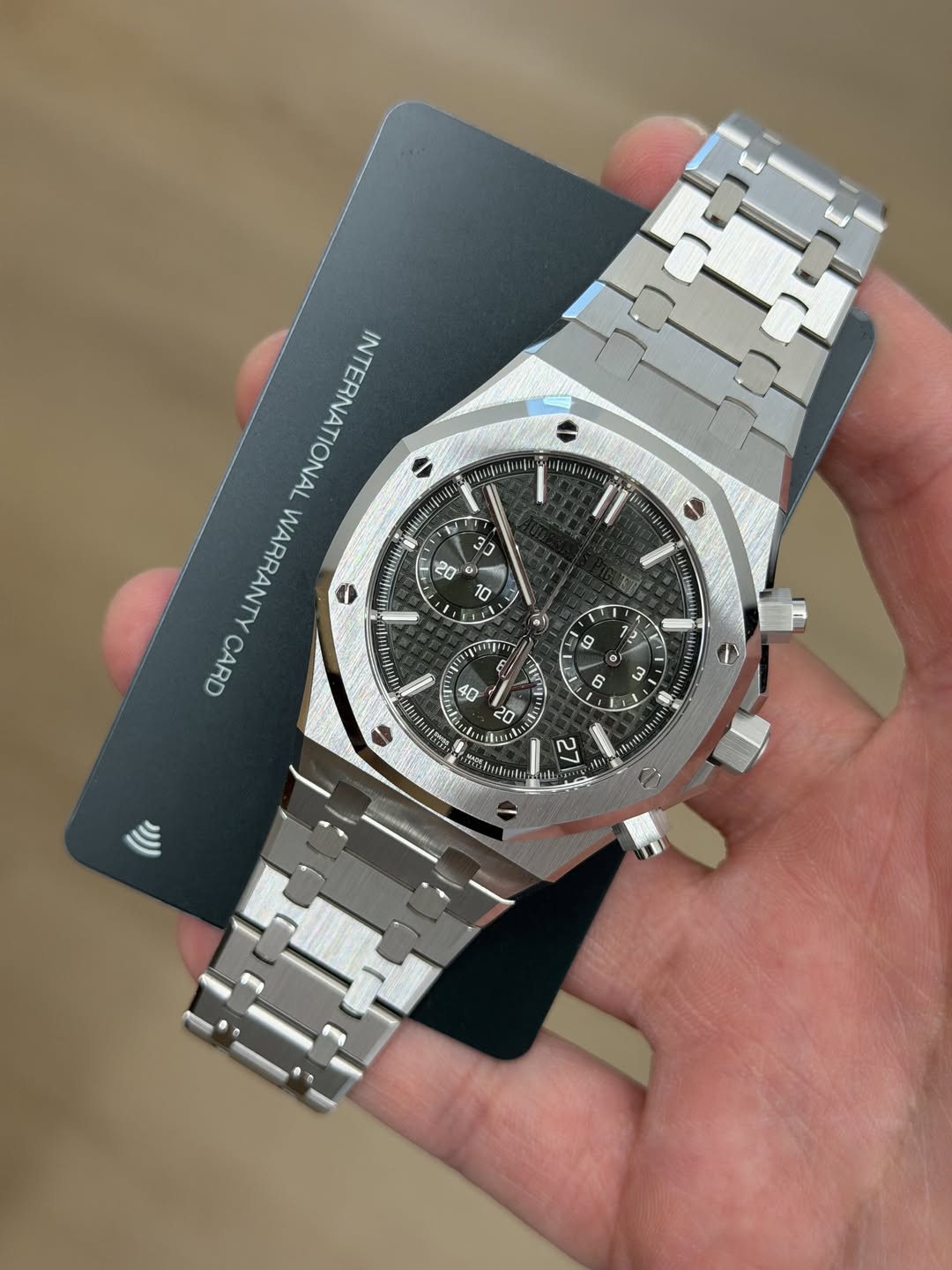 May be an image of wrist watch and text