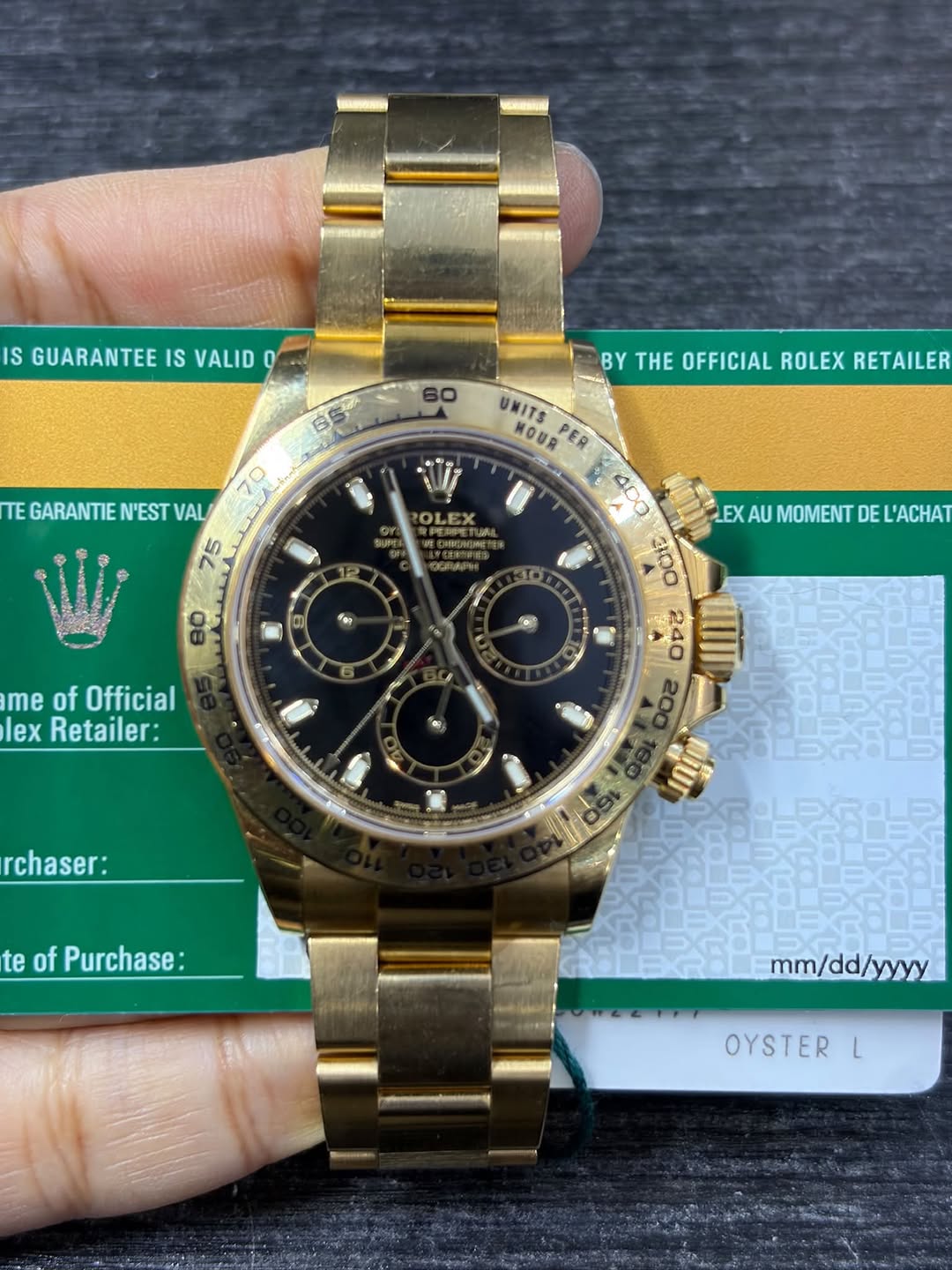 May be an image of wrist watch and text that says 'IS GUARANTEE IS VALID GUARANTEESVALID 0 BY THE OFFICIAL ROLEX RETAILER ار 70 O TE GARANTIE N'EST GARANTIEN'ESTVAL VAL 75 or…