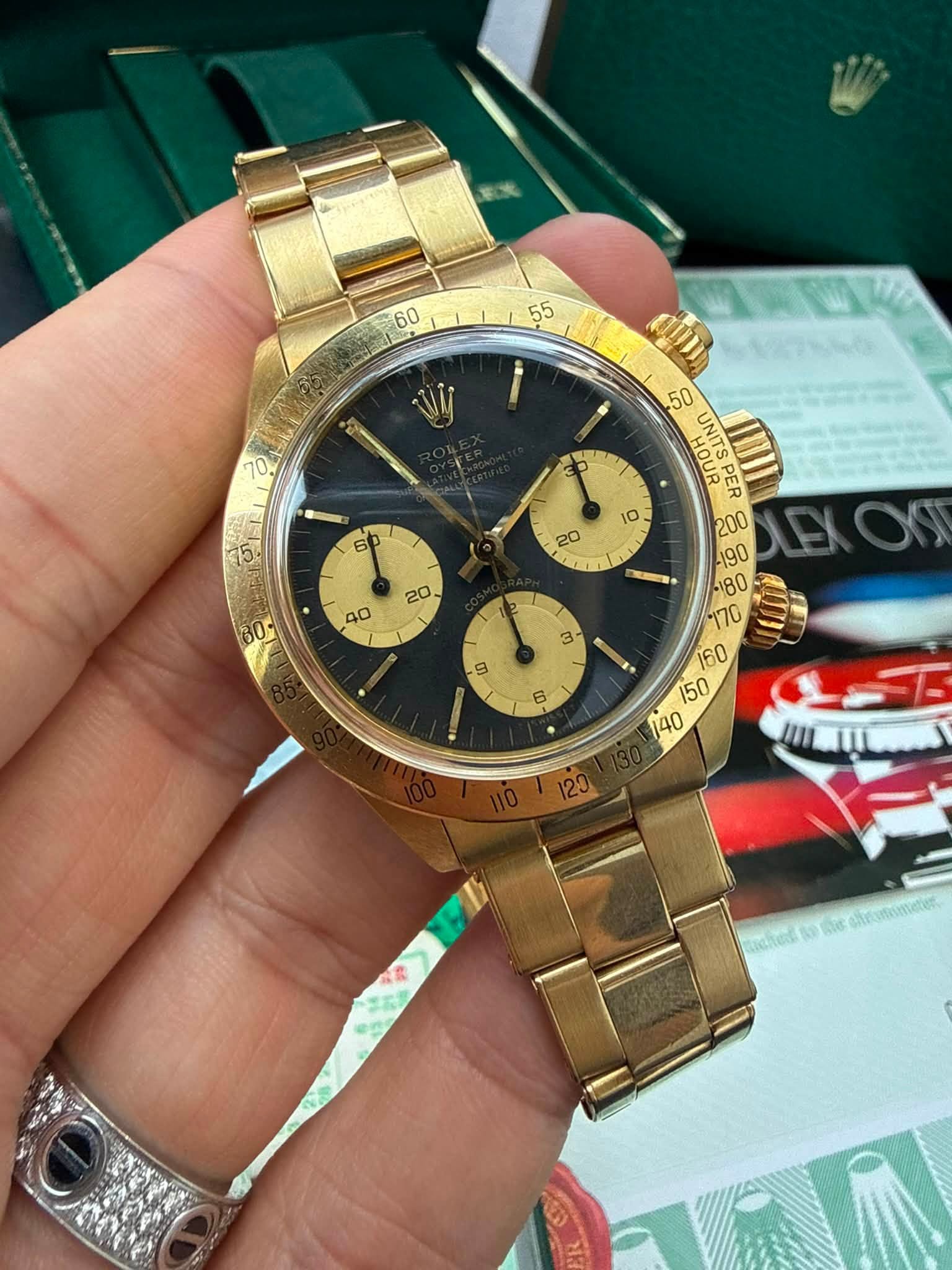 May be an image of wrist watch and text