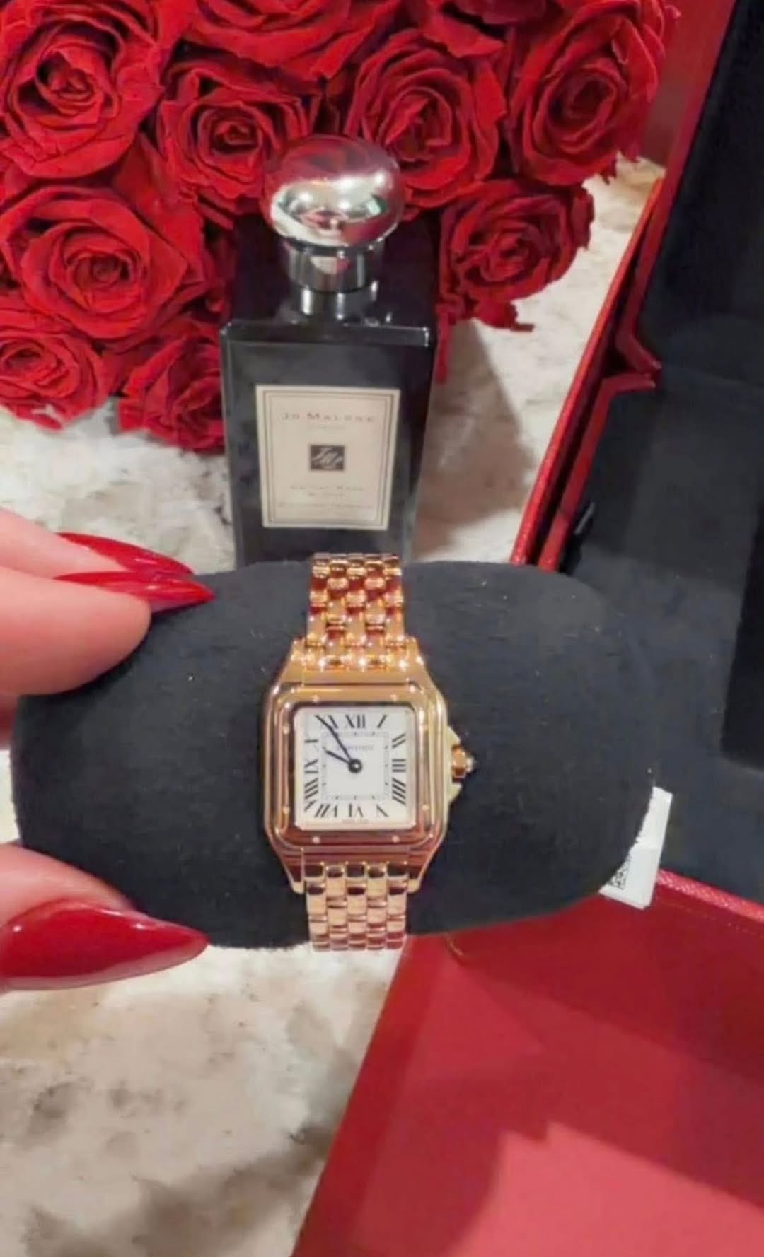 May be an image of wrist watch, fragrance and text