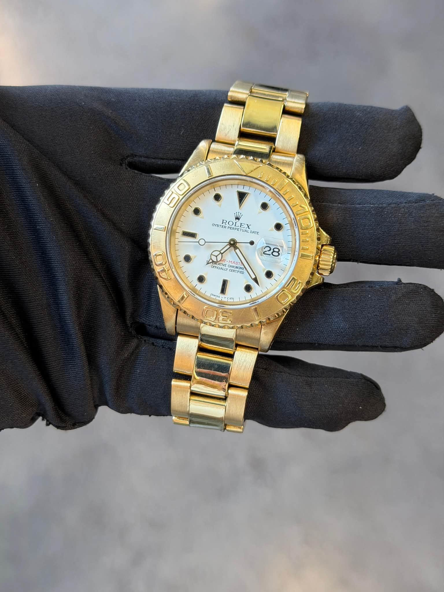 May be an image of wrist watch and text