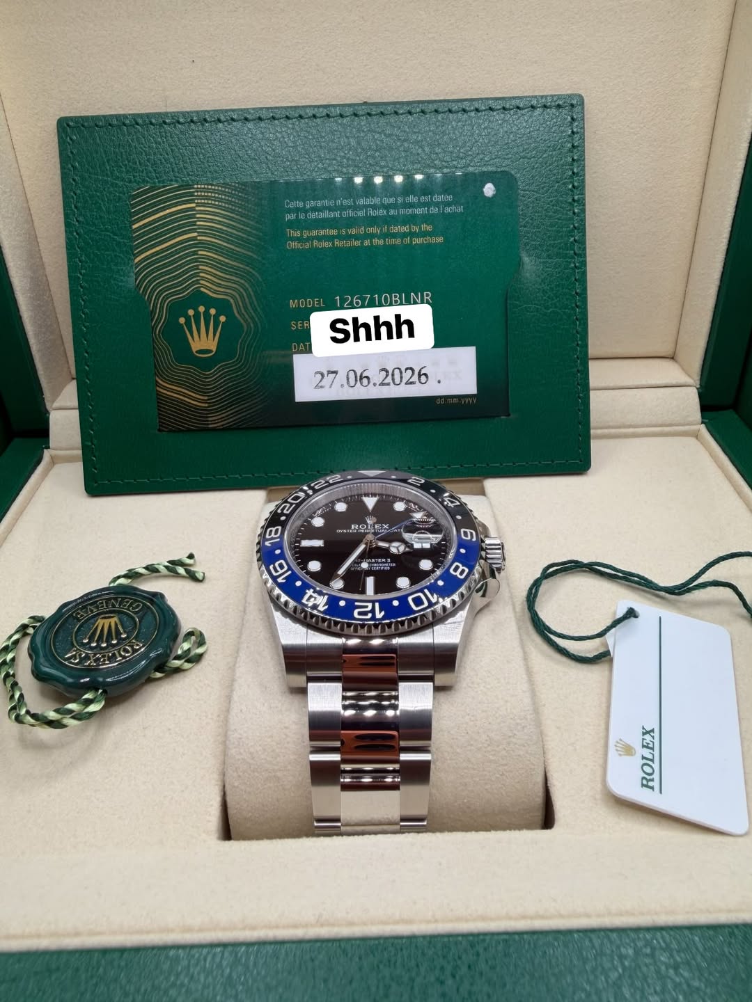 May be an image of wrist watch and text